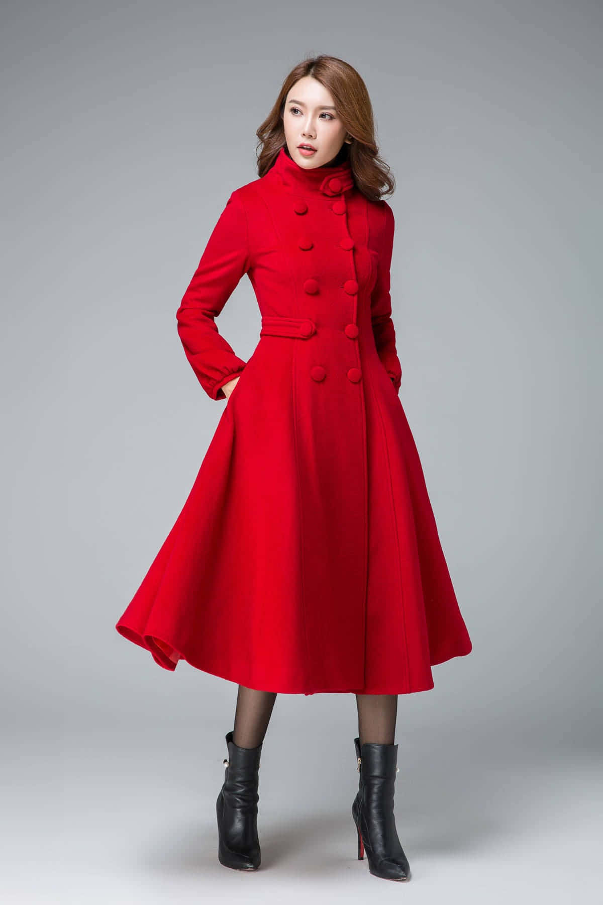 Elegant Woman in a Stunning Red Coat Wallpaper