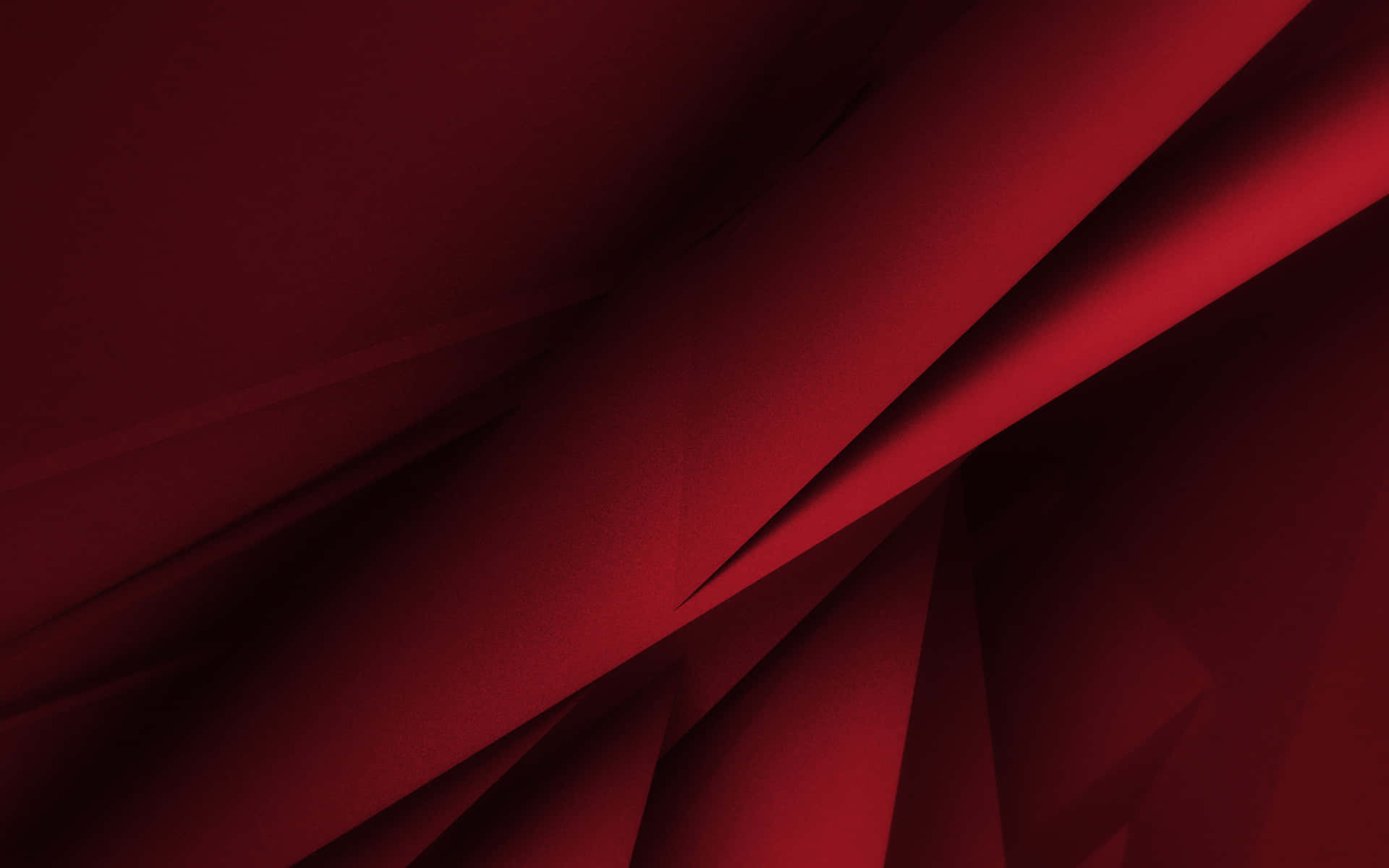 "Abstract red color background, with shapes slowly shifting in shades and tones"
