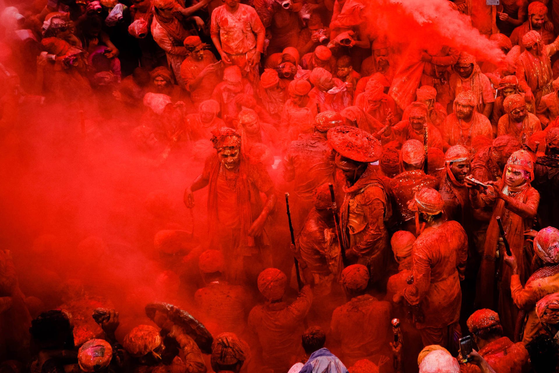 Red Covered India Holi Revelers Wallpaper