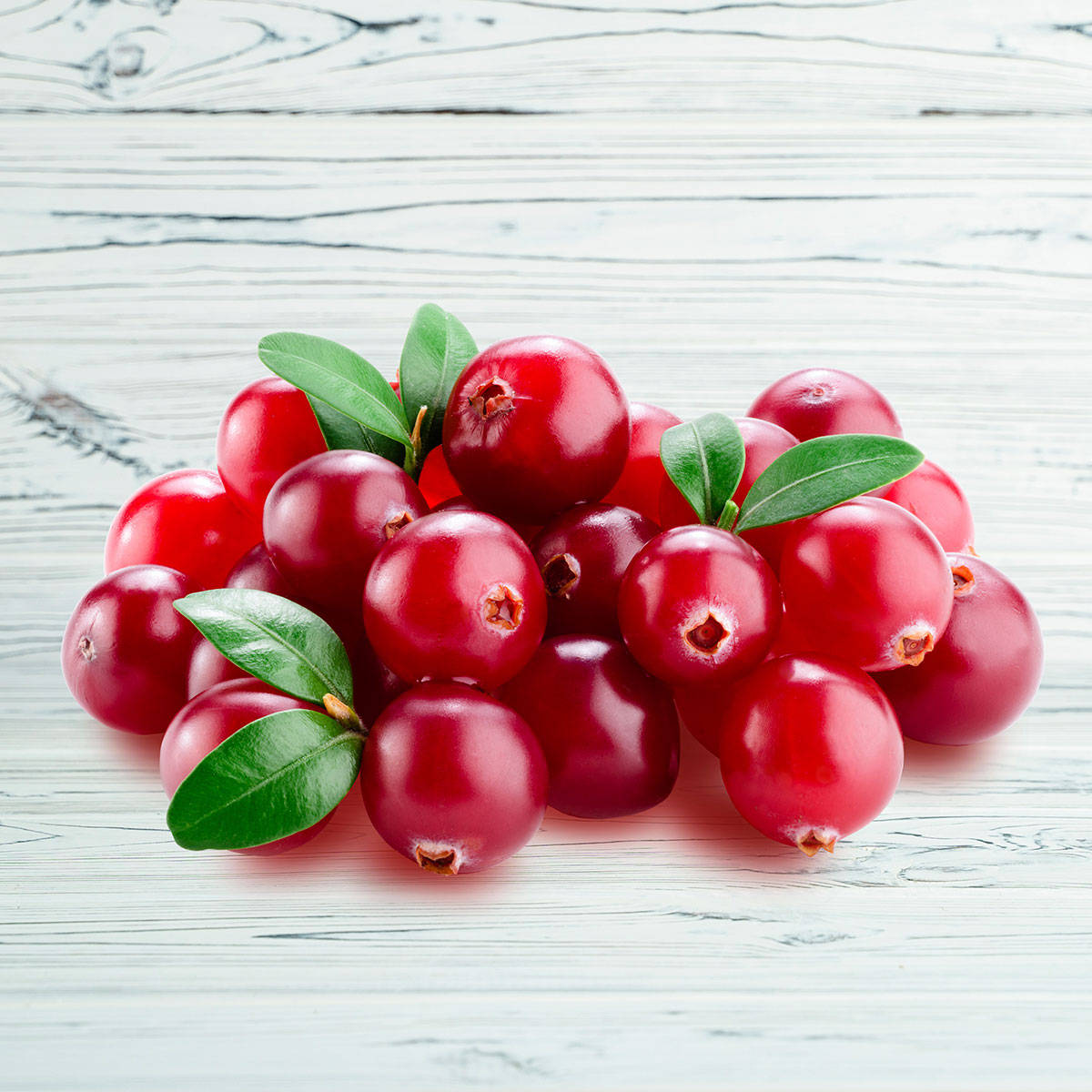 Red Cranberries On Wooden Table Wallpaper