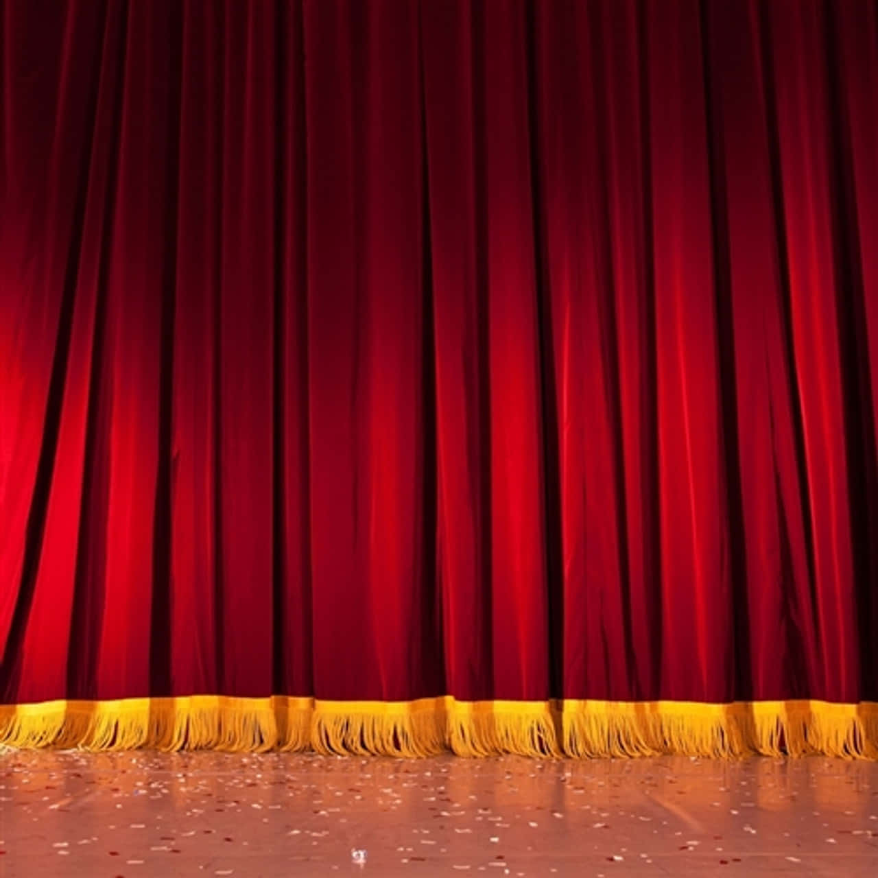 "A dramatic effect created by a gorgeous, red velvet theatre curtain"