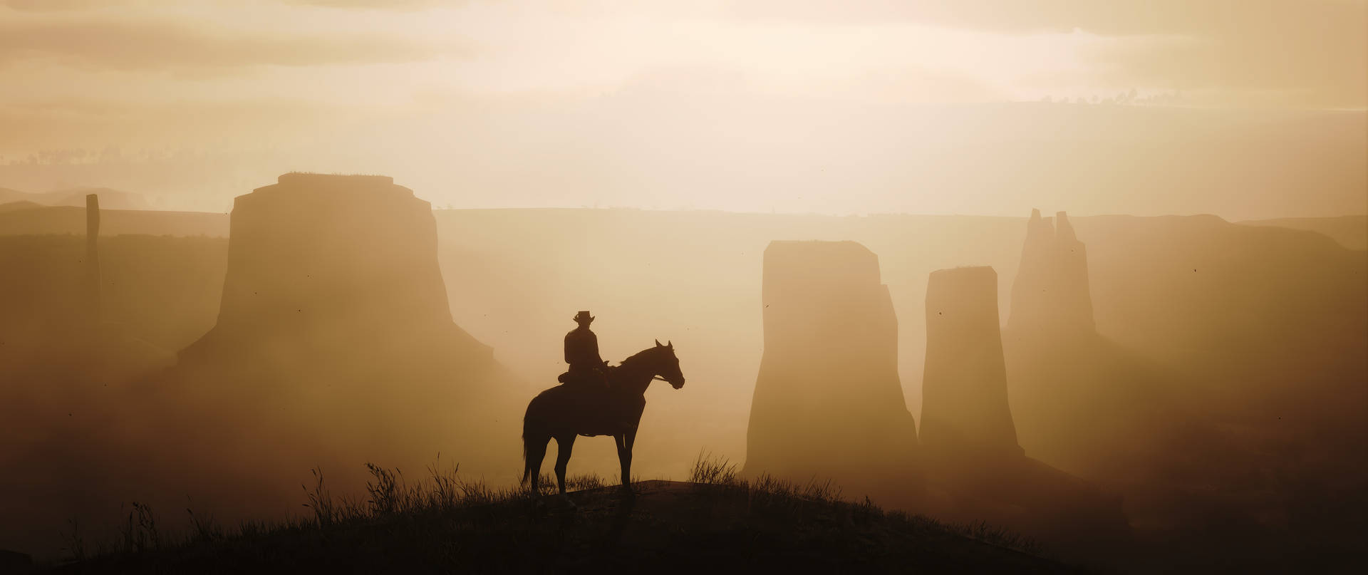a man on a horse is standing on a hill Wallpaper