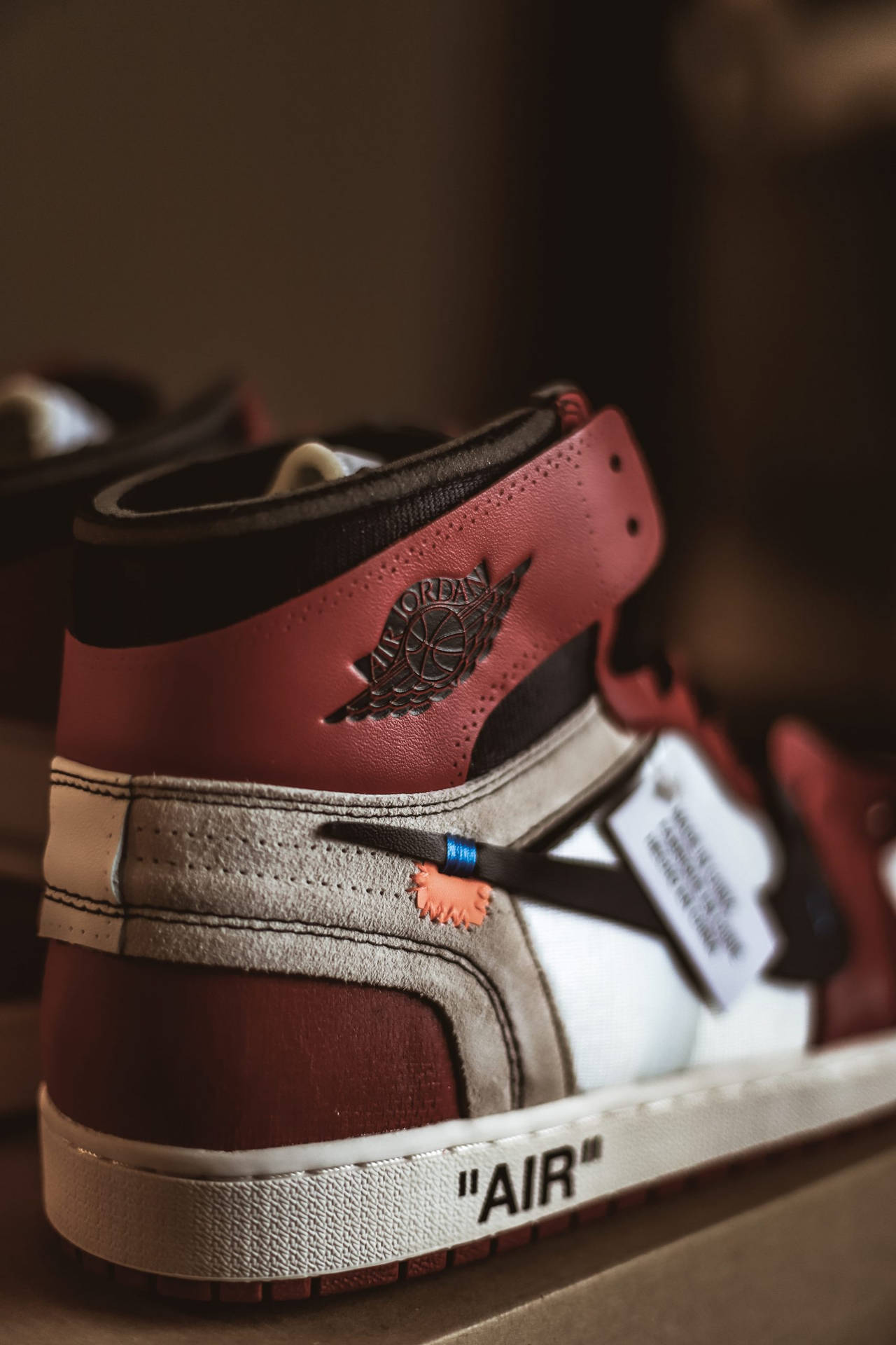 A Pair Of Air Jordan 1's With A Red And White Color Scheme Wallpaper