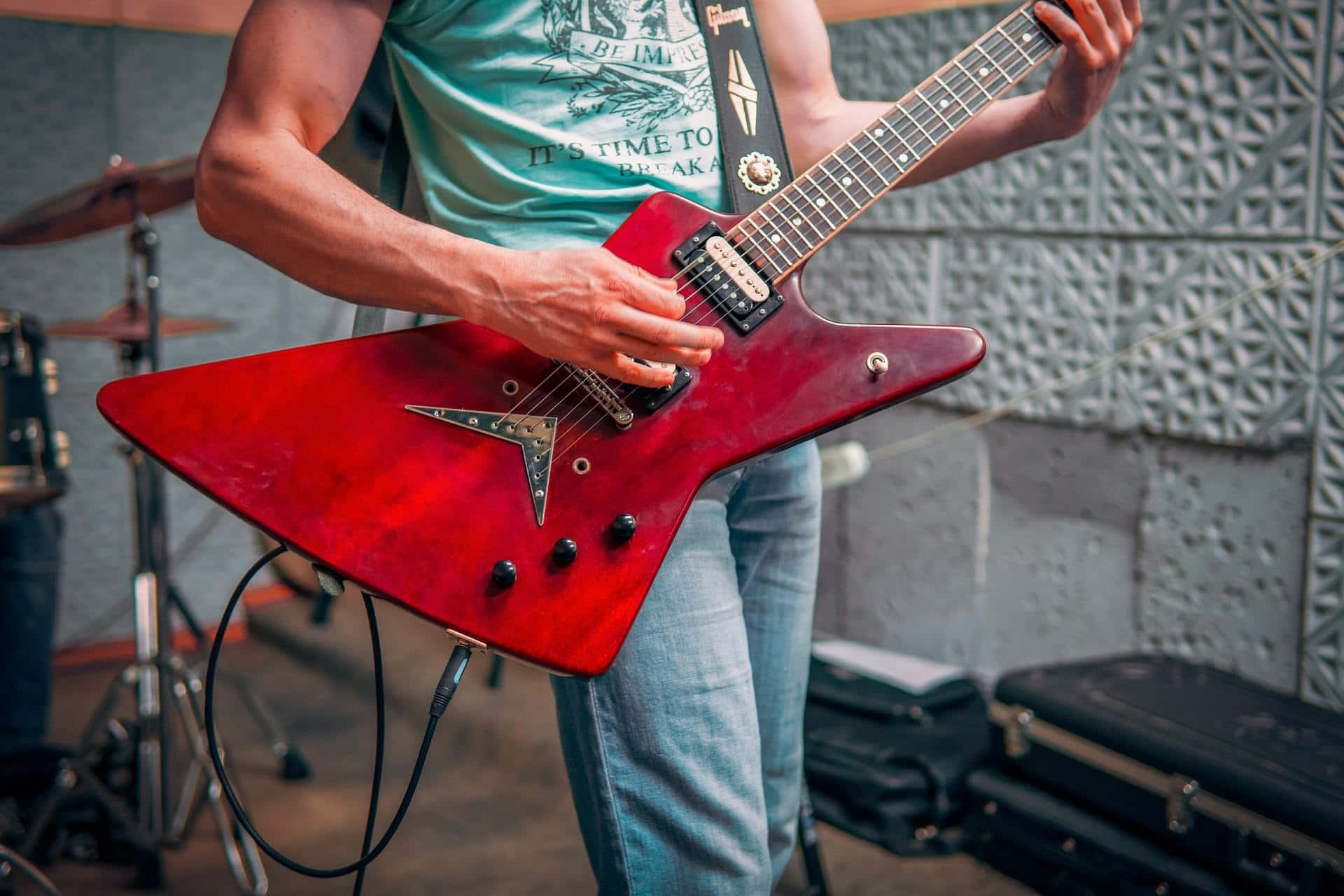 Red Electric Guitar Performance.jpg Wallpaper
