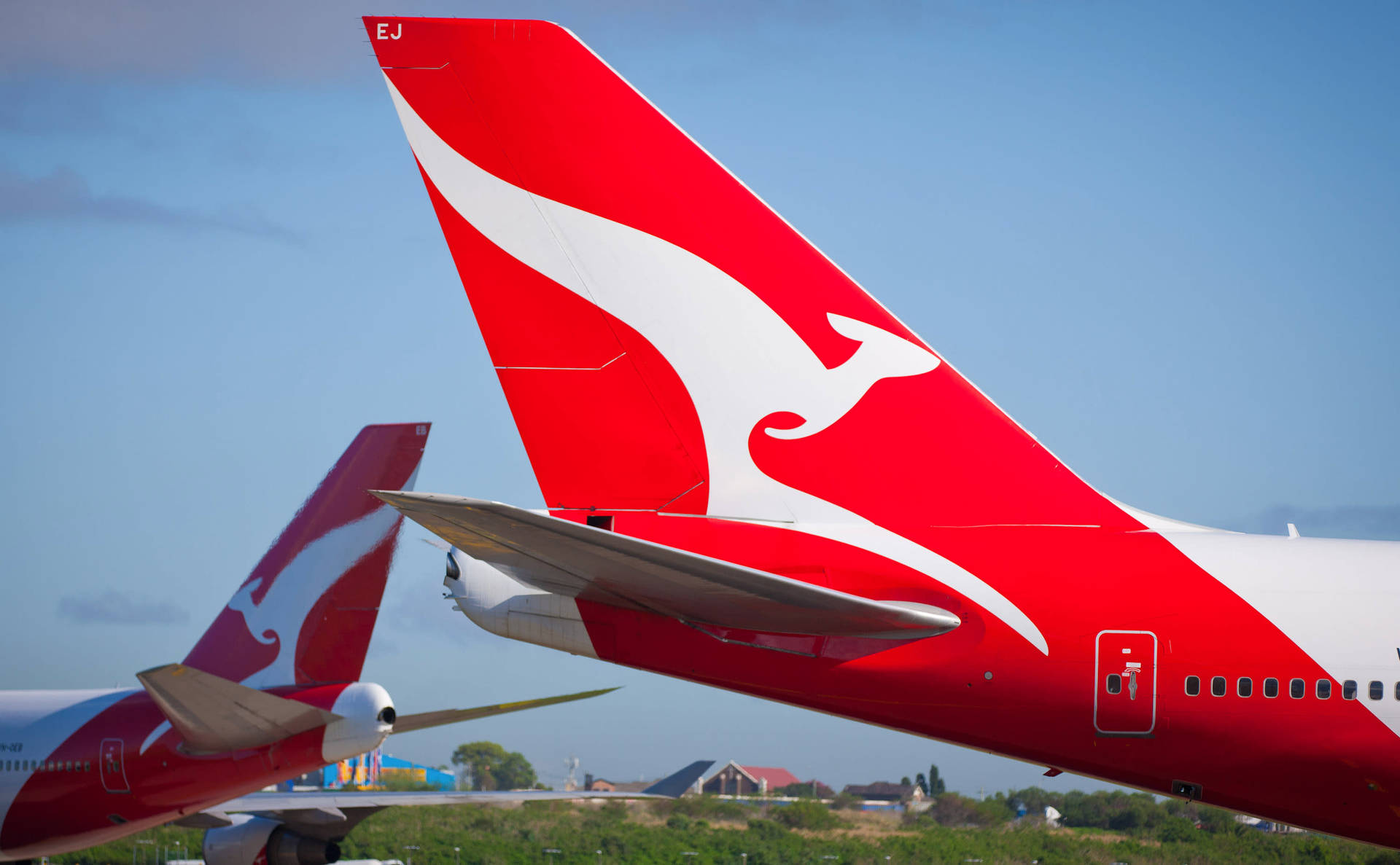 Red Empennage Of Qantas Airways Wallpaper