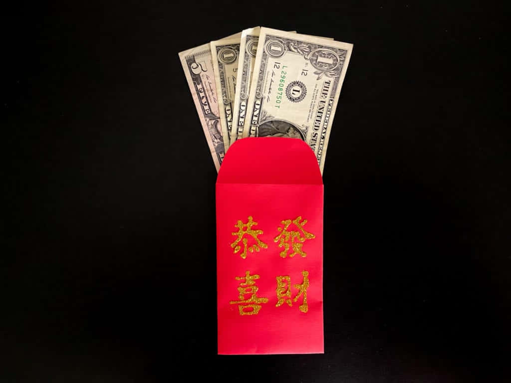 Red Envelope with Gold Chinese Pattern on Dark Background Wallpaper
