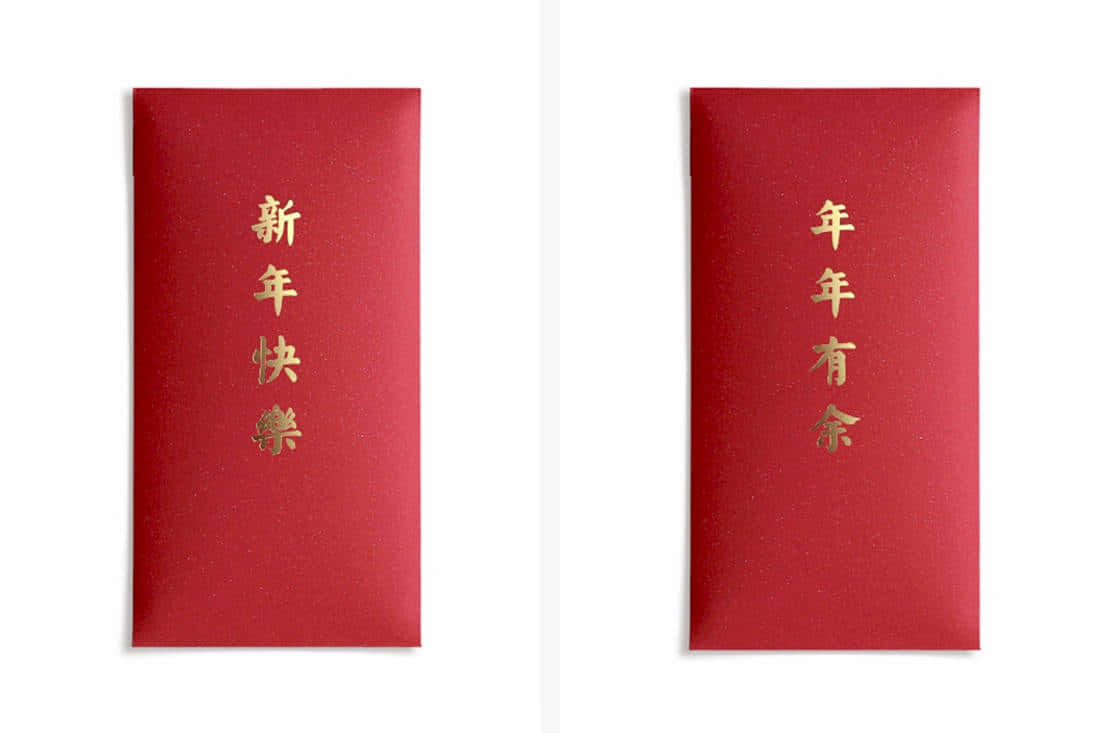 Red Envelope on a Wooden Table Wallpaper
