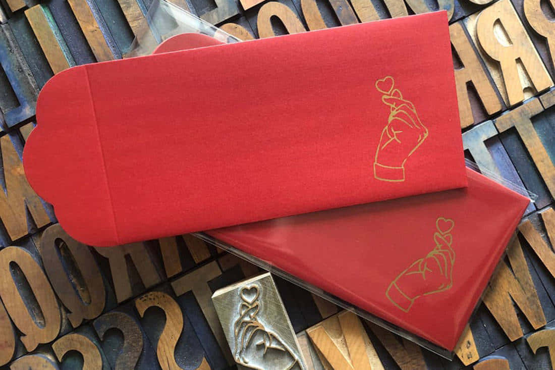 Red Envelope with Golden Ribbon Wallpaper