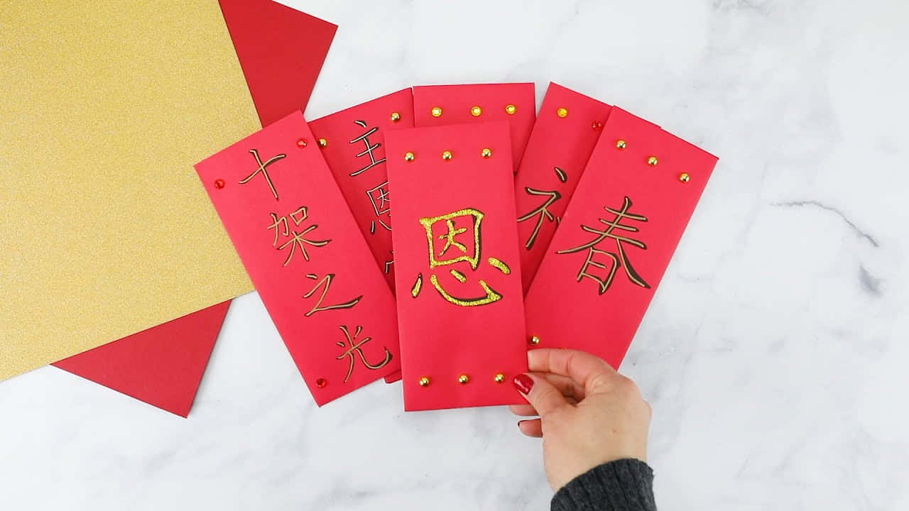 Red Envelope with a Golden Bow Wallpaper
