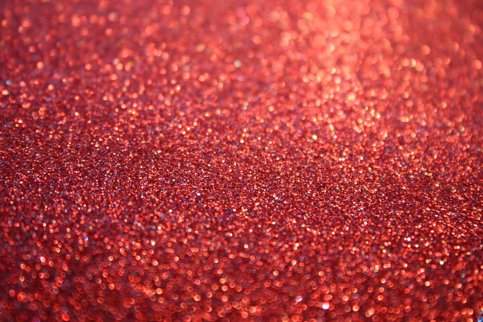 Brighten your space with this vibrant and glittering Red Glitter Background
