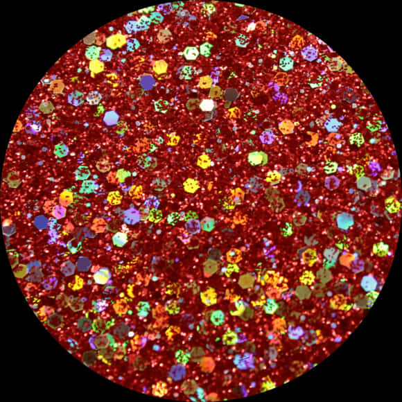 Red Glitter Texture Closeup Wallpaper — A circular burst of vibrant red glitter with multicolored hexagonal flakes shimmering against a black background.