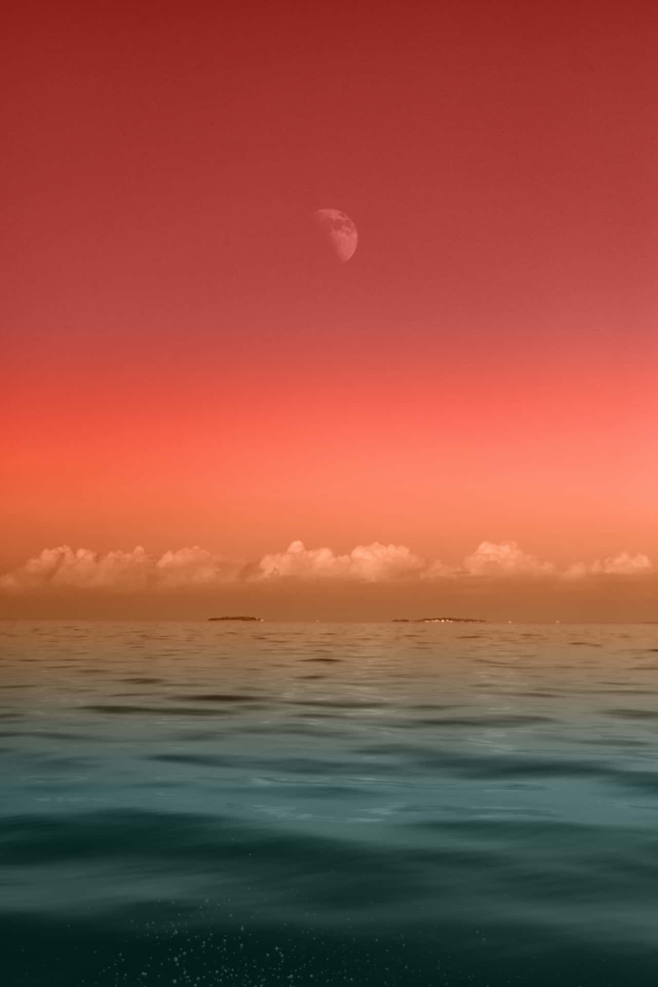 Dunkelgrünesmeer Und Roter Himmel Verlaufshintergrund