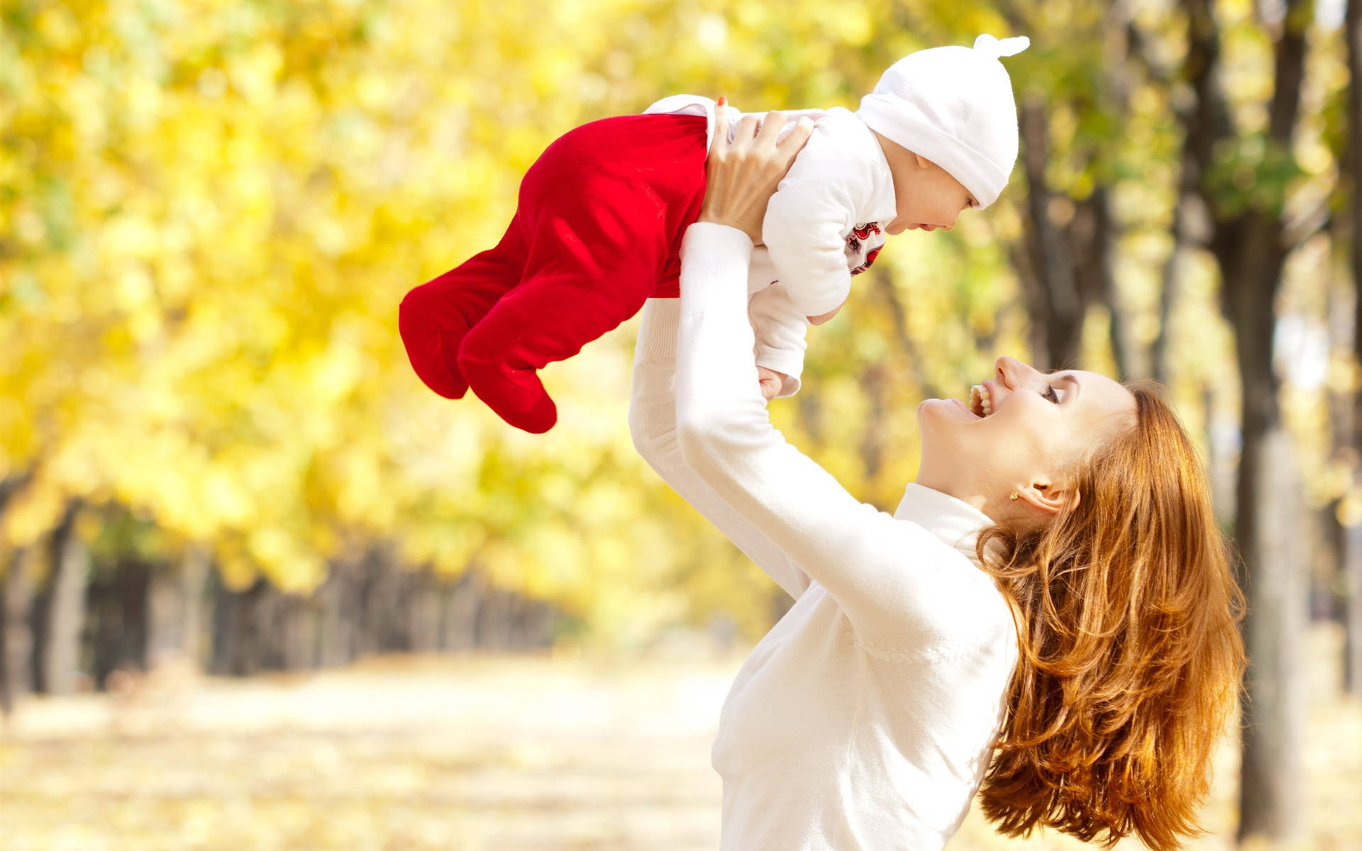 Red Haired Mother And Baby Wallpaper
