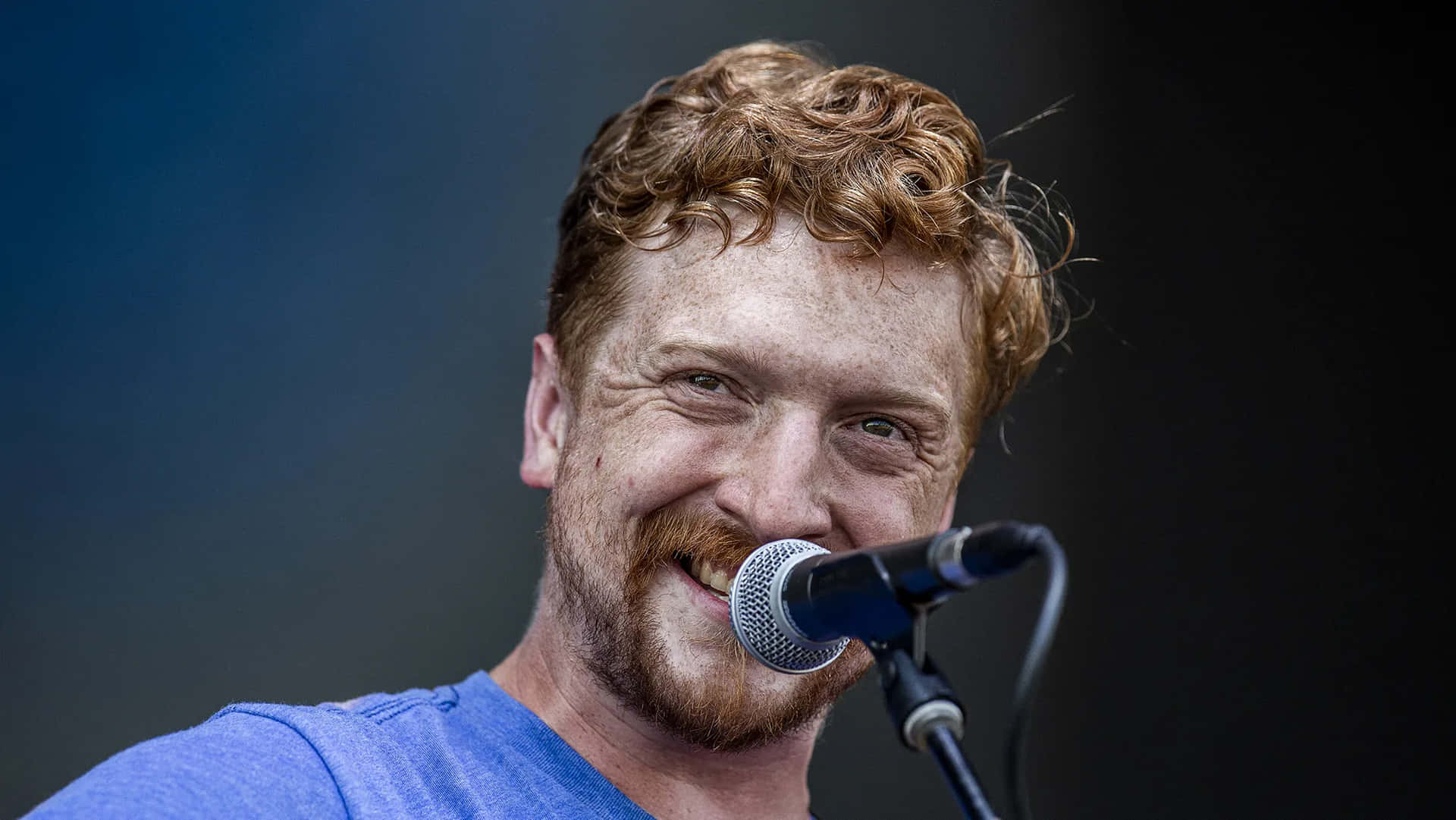Red Haired Musician Performing Live Wallpaper