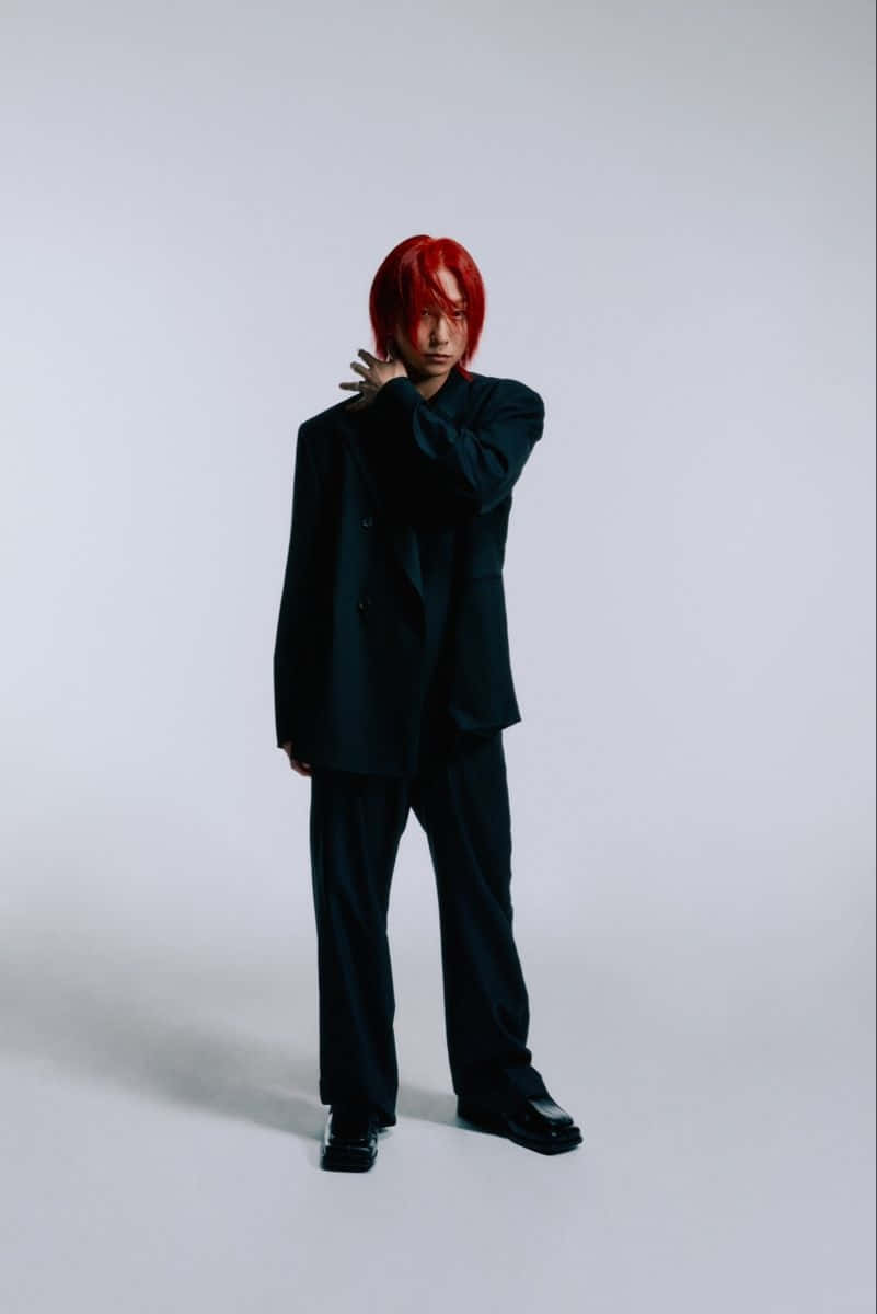Red Haired Personin Black Suit Wallpaper