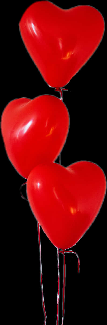 Red Heart Shaped Balloonson Black Background PNG