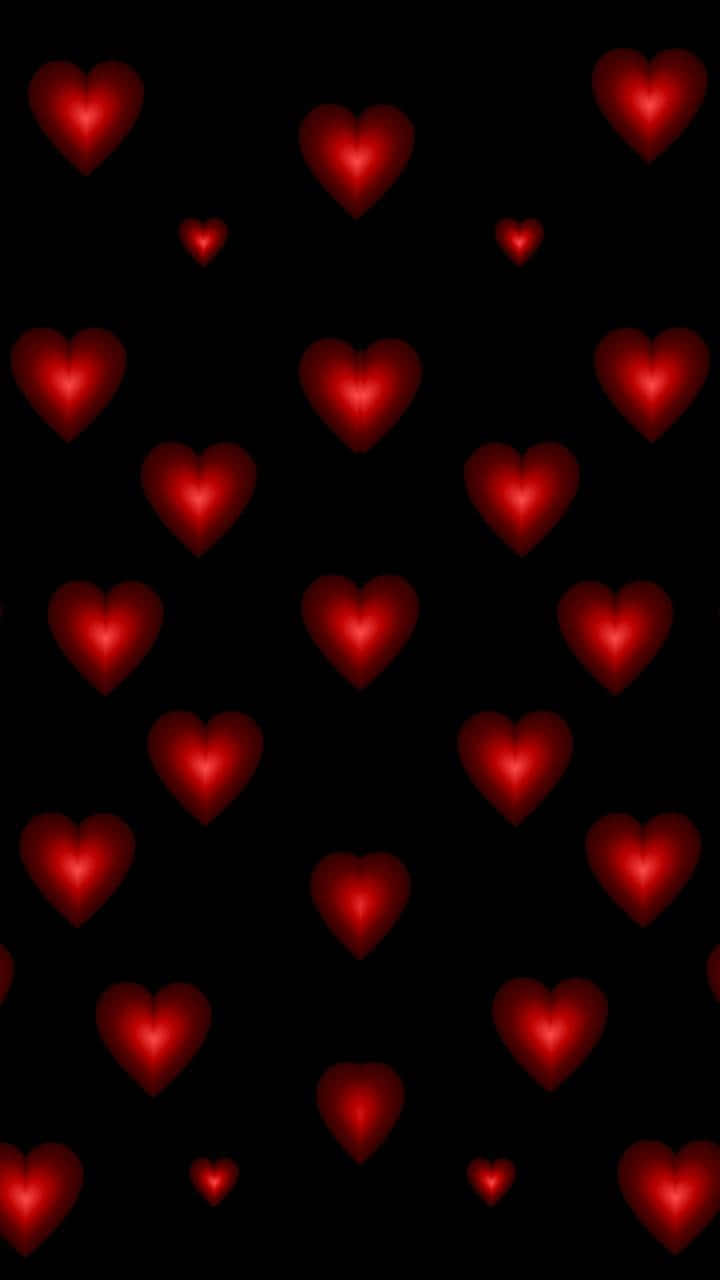 Download Red Hearts On Black Background Wallpaper 