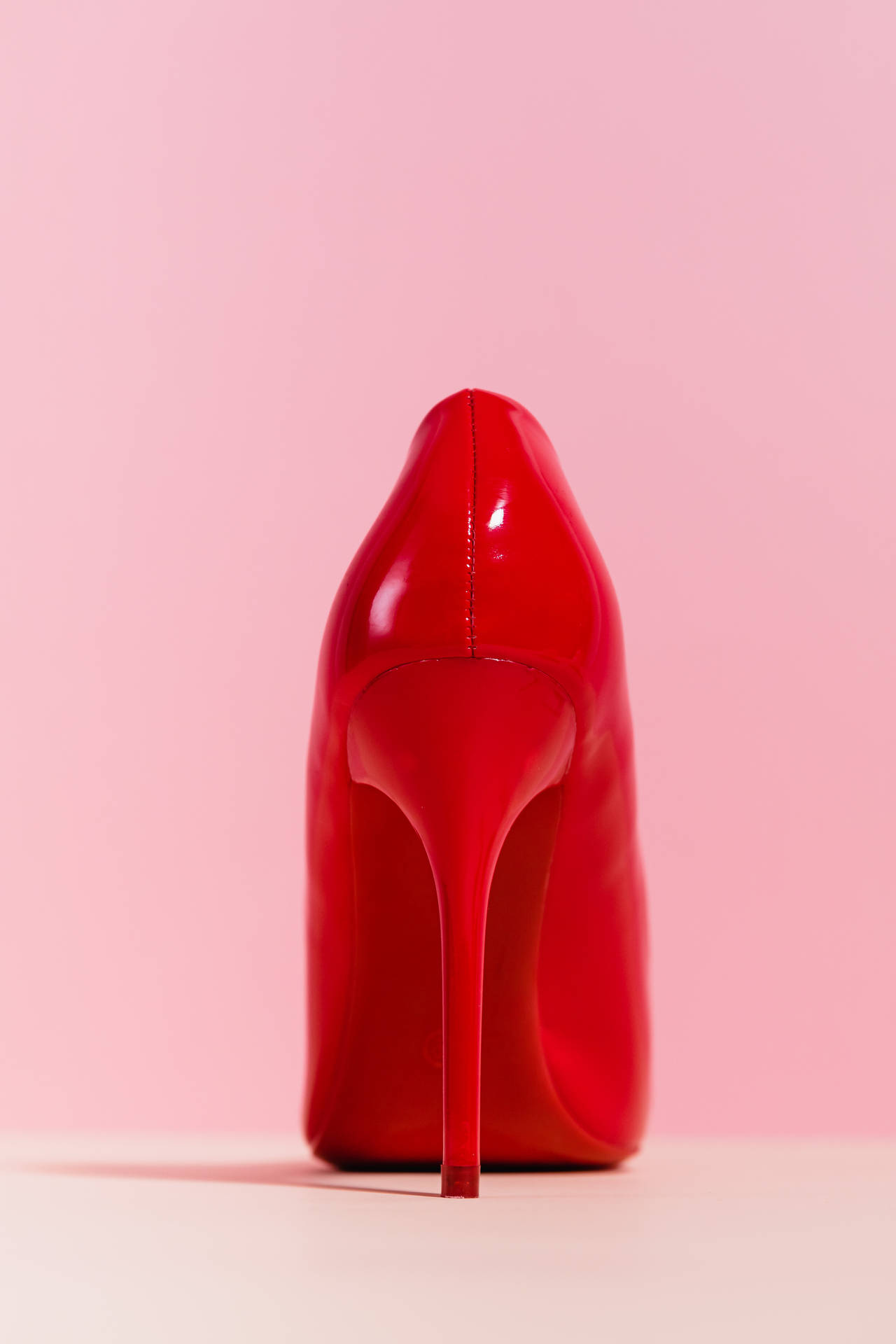 Red Heels On Pink Background Wallpaper