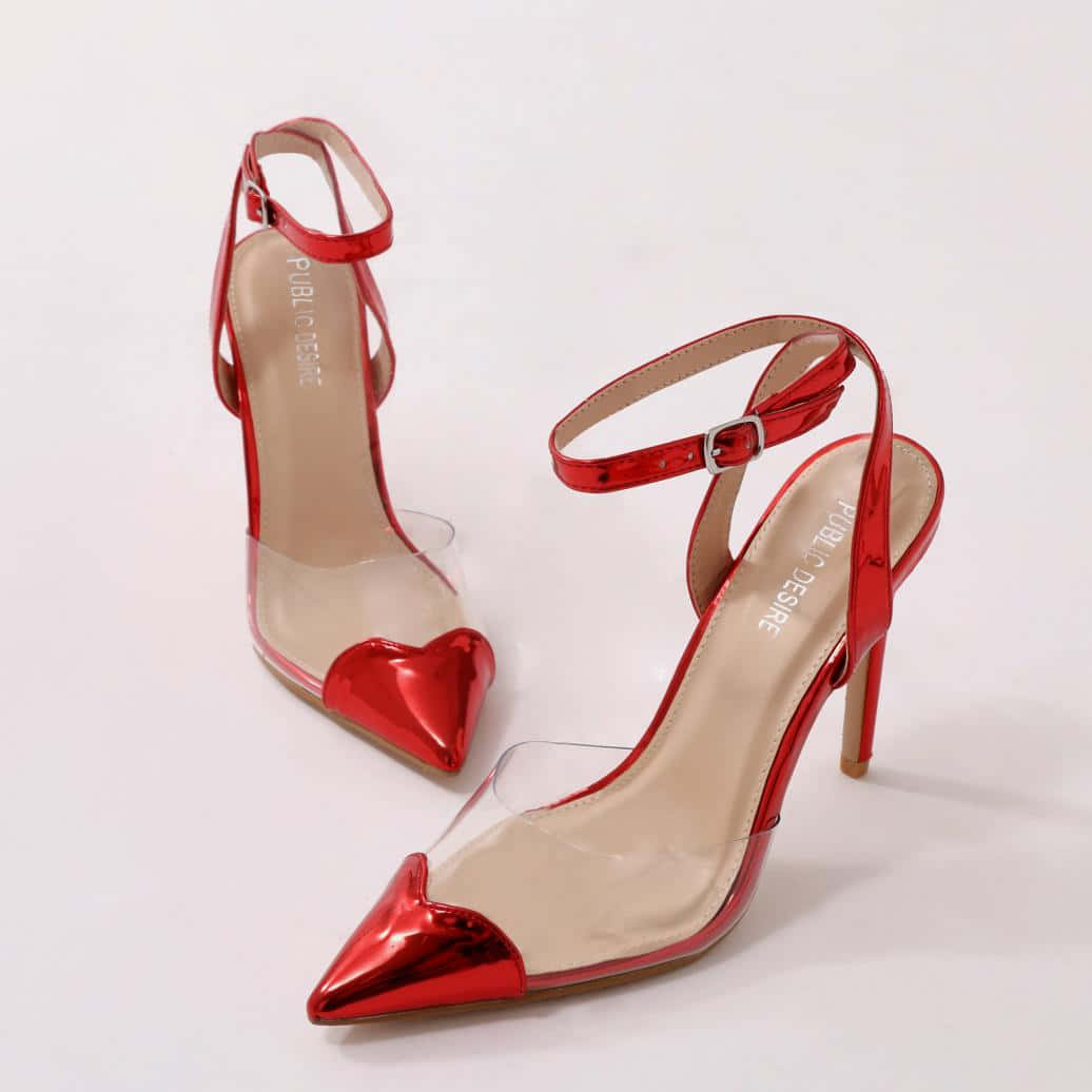 Elegant red high heels on a sleek background Wallpaper