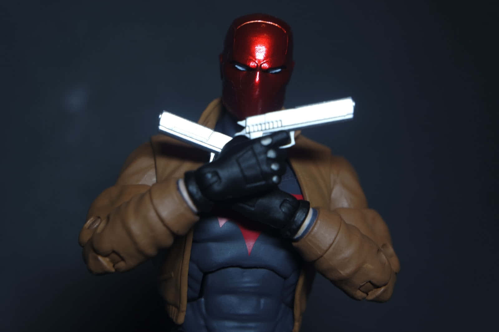 Red Hood fighting crime in Gotham City