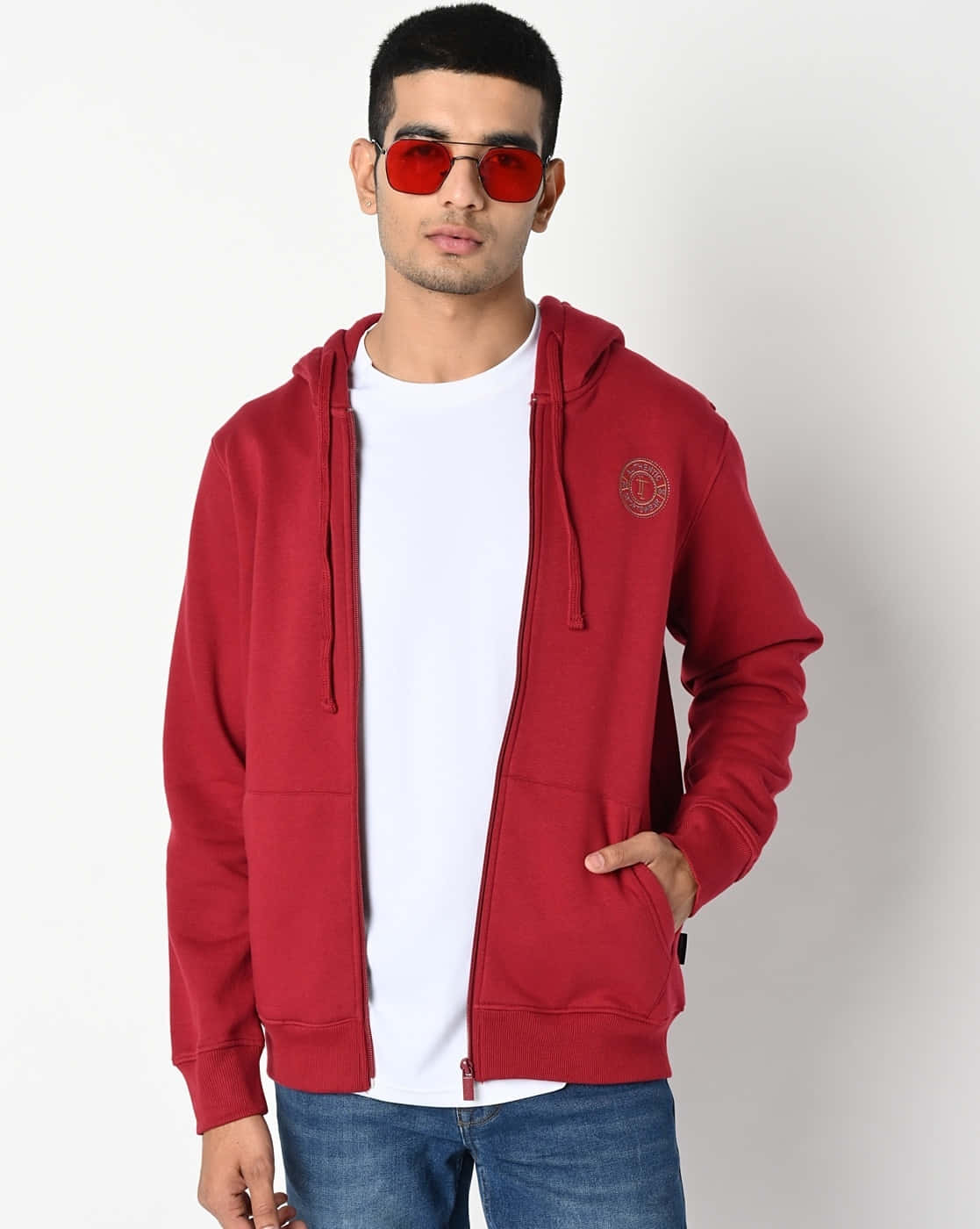 Trendy red hoodie in a striking pose Wallpaper