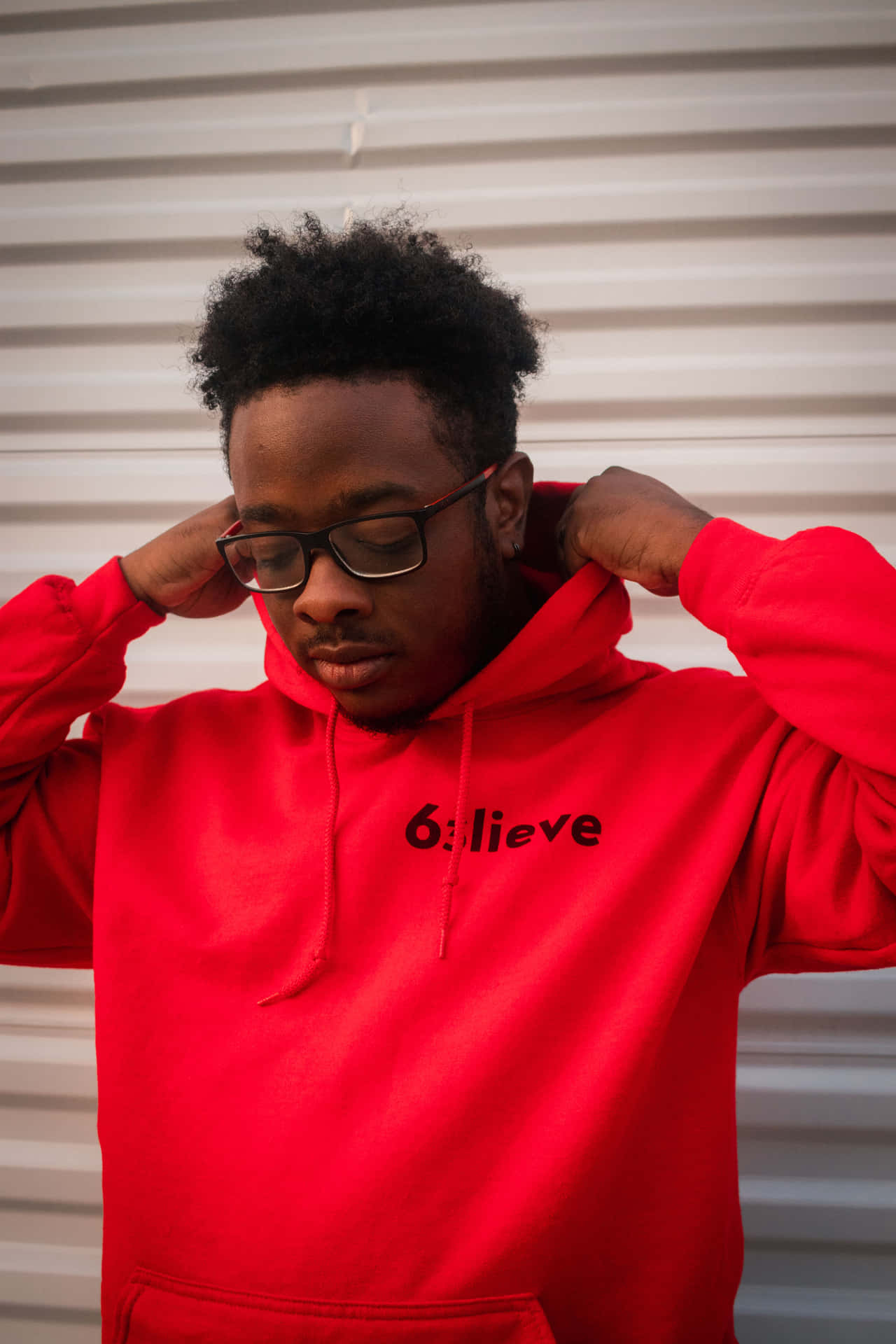 Person Wearing Vibrant Red Hoodie Wallpaper