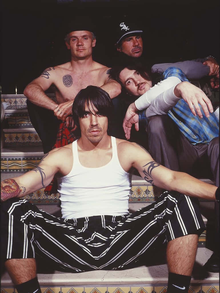Red Hot Chili Peppers Posing On The Stairs Wallpaper
