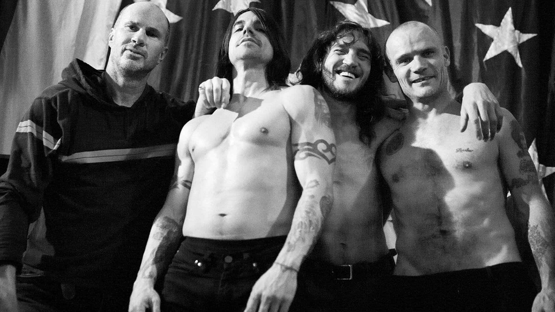 Red Hot Chili Peppers Members Posing Shirtless Wallpaper