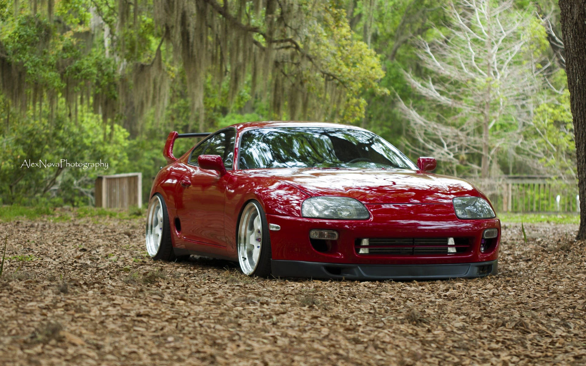 Cruise in Style in this Red JDM Toyota Supra Wallpaper