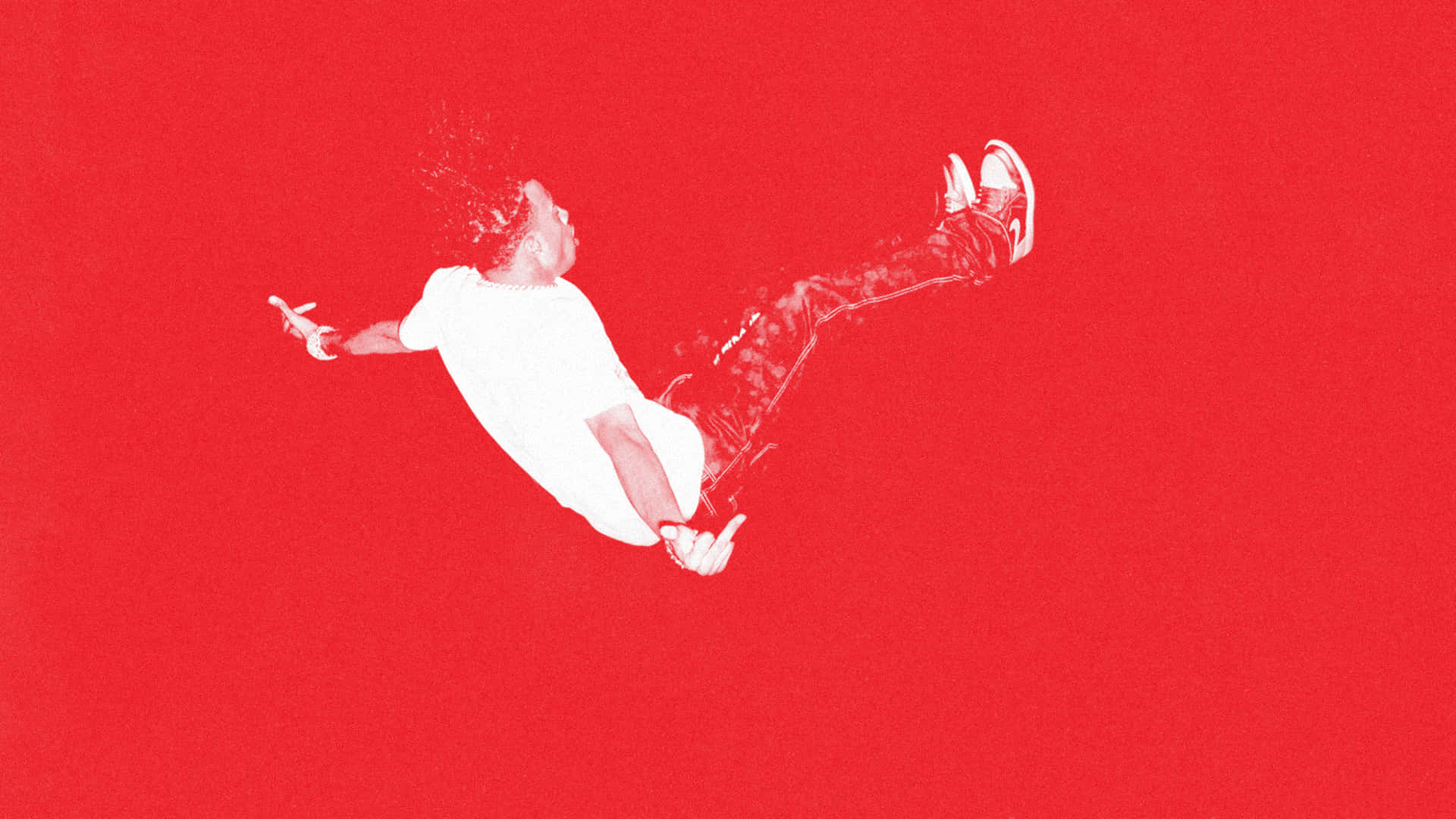 Electrifying Action - Carti in Mid-Air Wallpaper