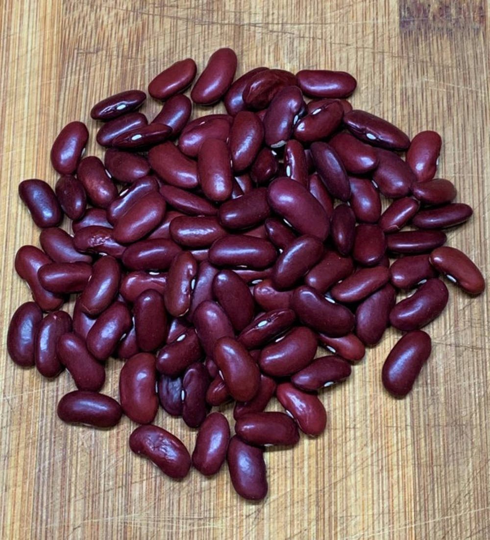 Red Kidney Beans On Wooden Table Wallpaper