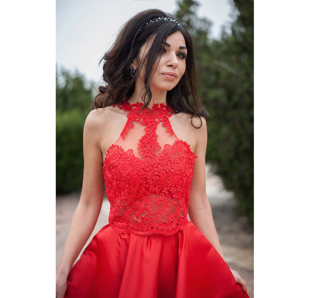 Elegant Red Lace Dress on Display Wallpaper