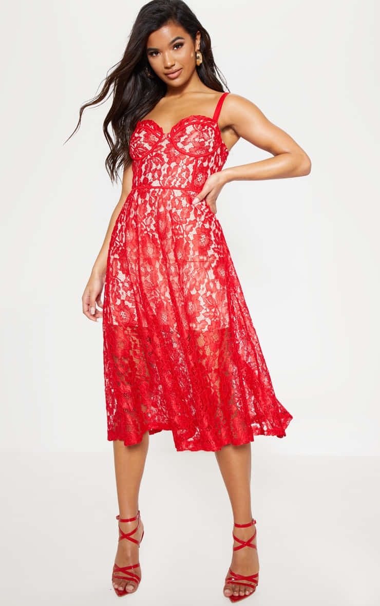 Elegant red lace dress on a beautiful model Wallpaper