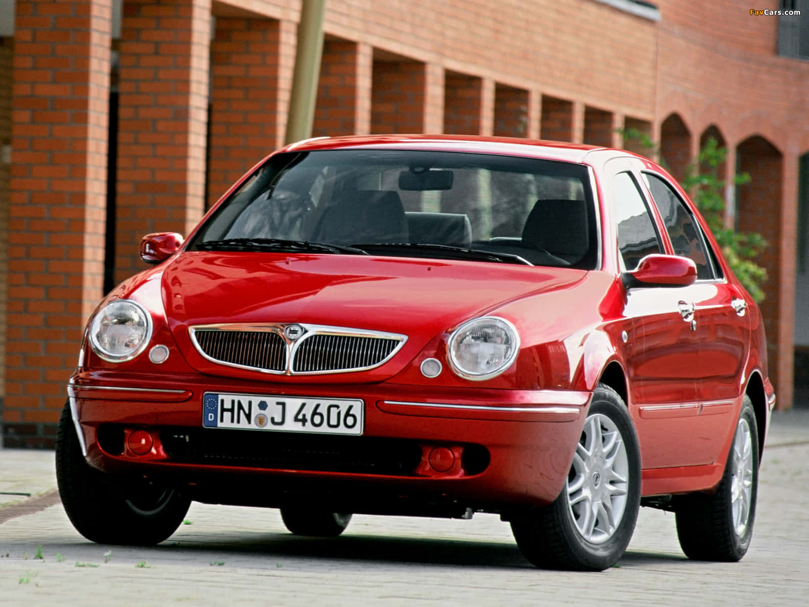 Rode Lancia Lybra Sedan Achtergrond