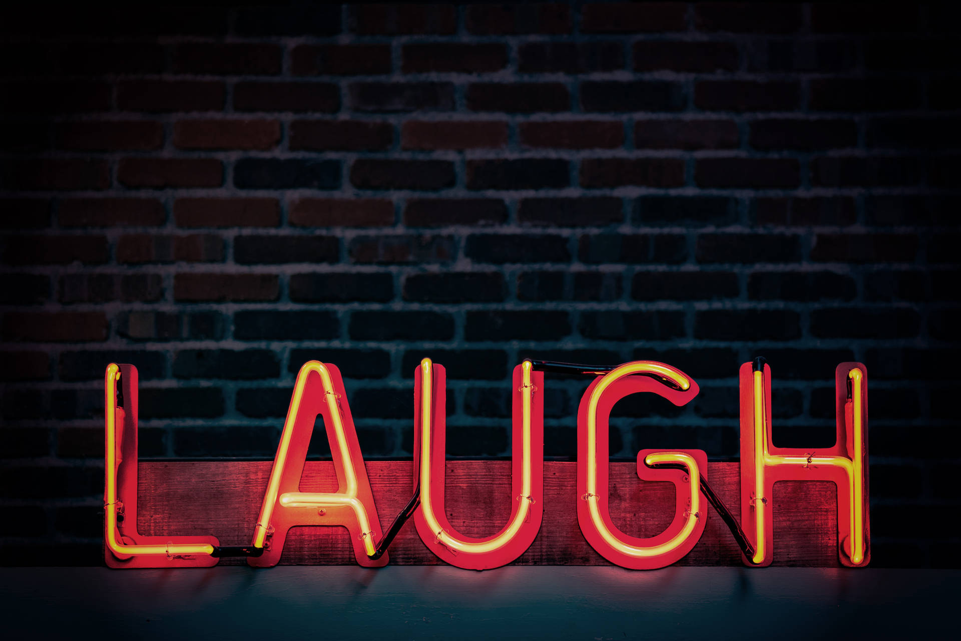 Red Laugh Neon Sign Wallpaper