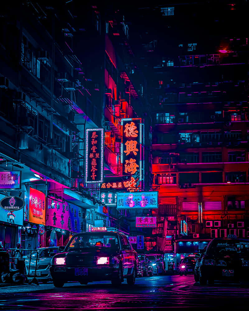 A Vibrant Night View of the Red Light District Wallpaper