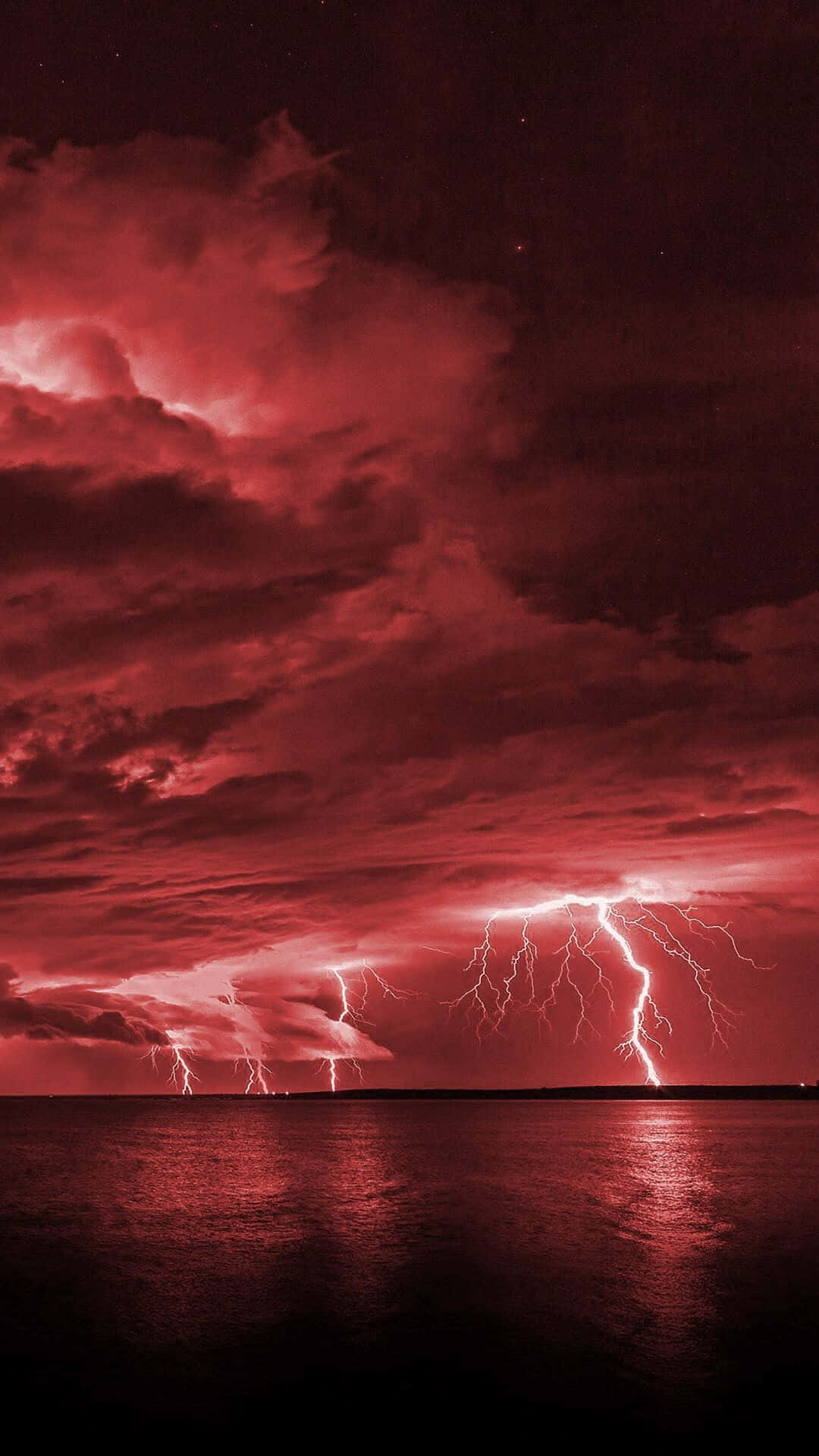 Red Lightning Over Ocean View Wallpaper
