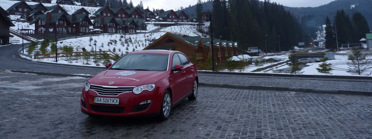 Sedan Mg 550 Merah Di Pemandangan Musim Dingin Wallpaper