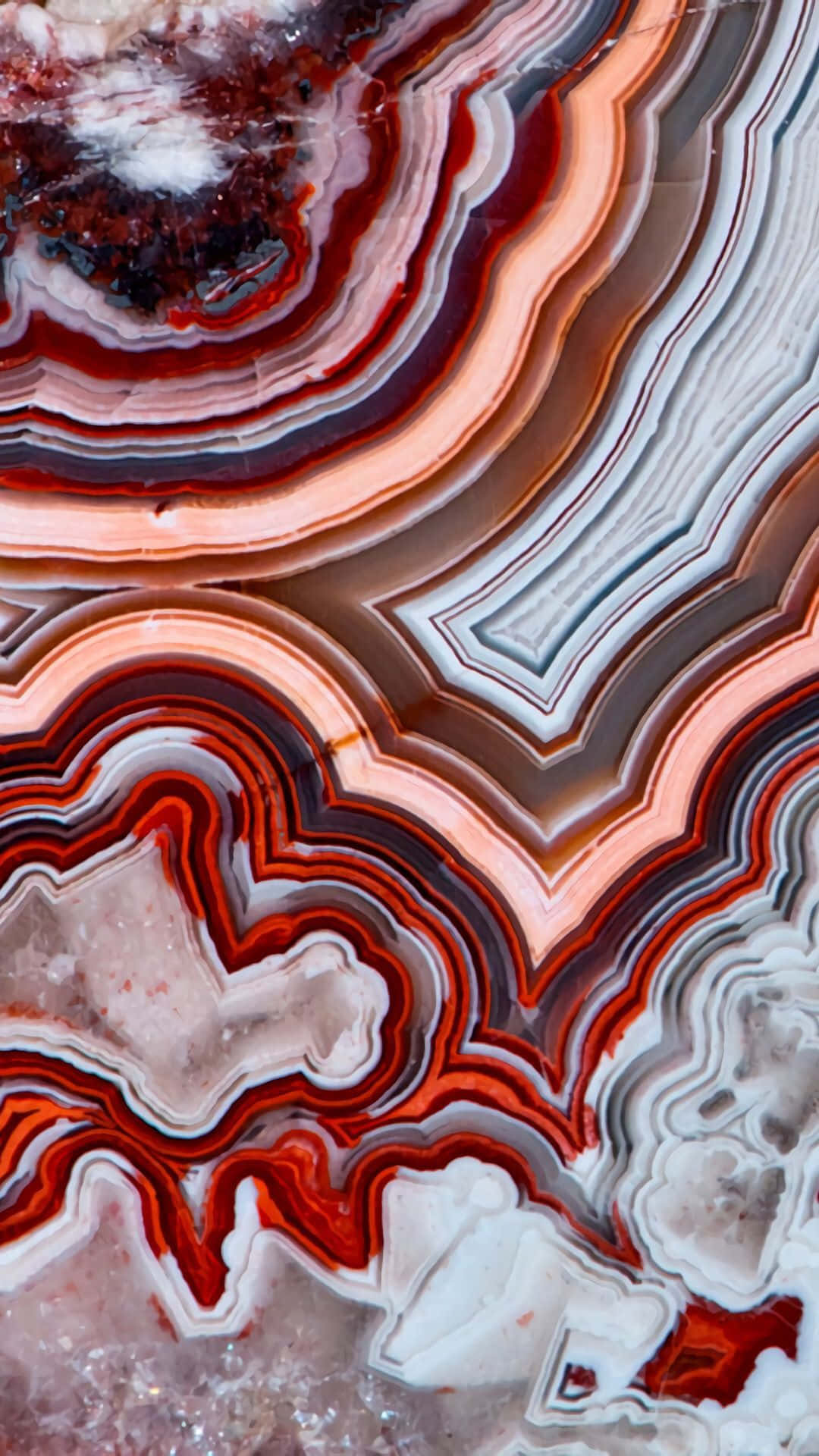 A bright and vibrant red marble background