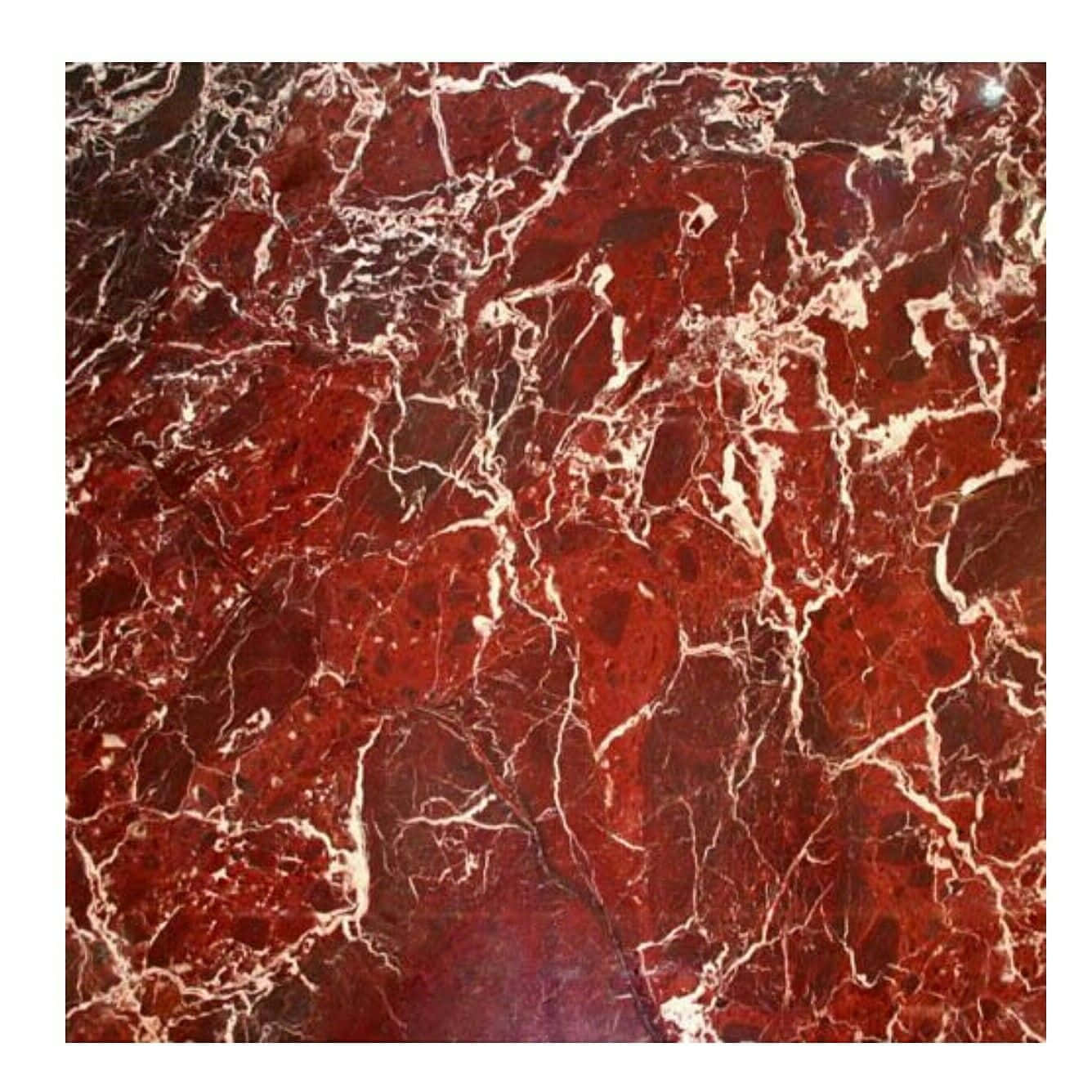A Red Marble Floor With White And Black Marble