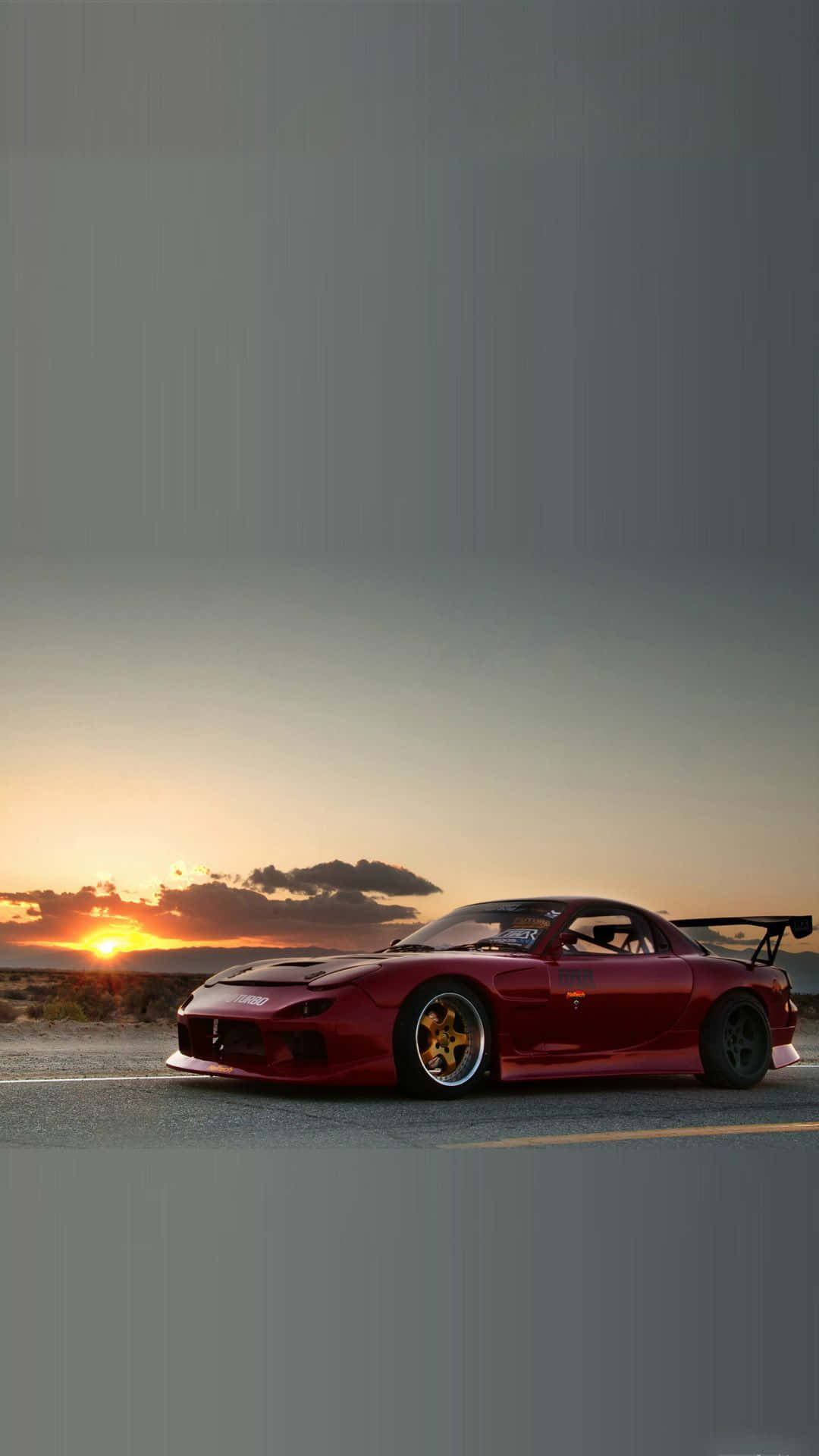 Rød Mazda Rx 7 ved solnedgang Wallpaper