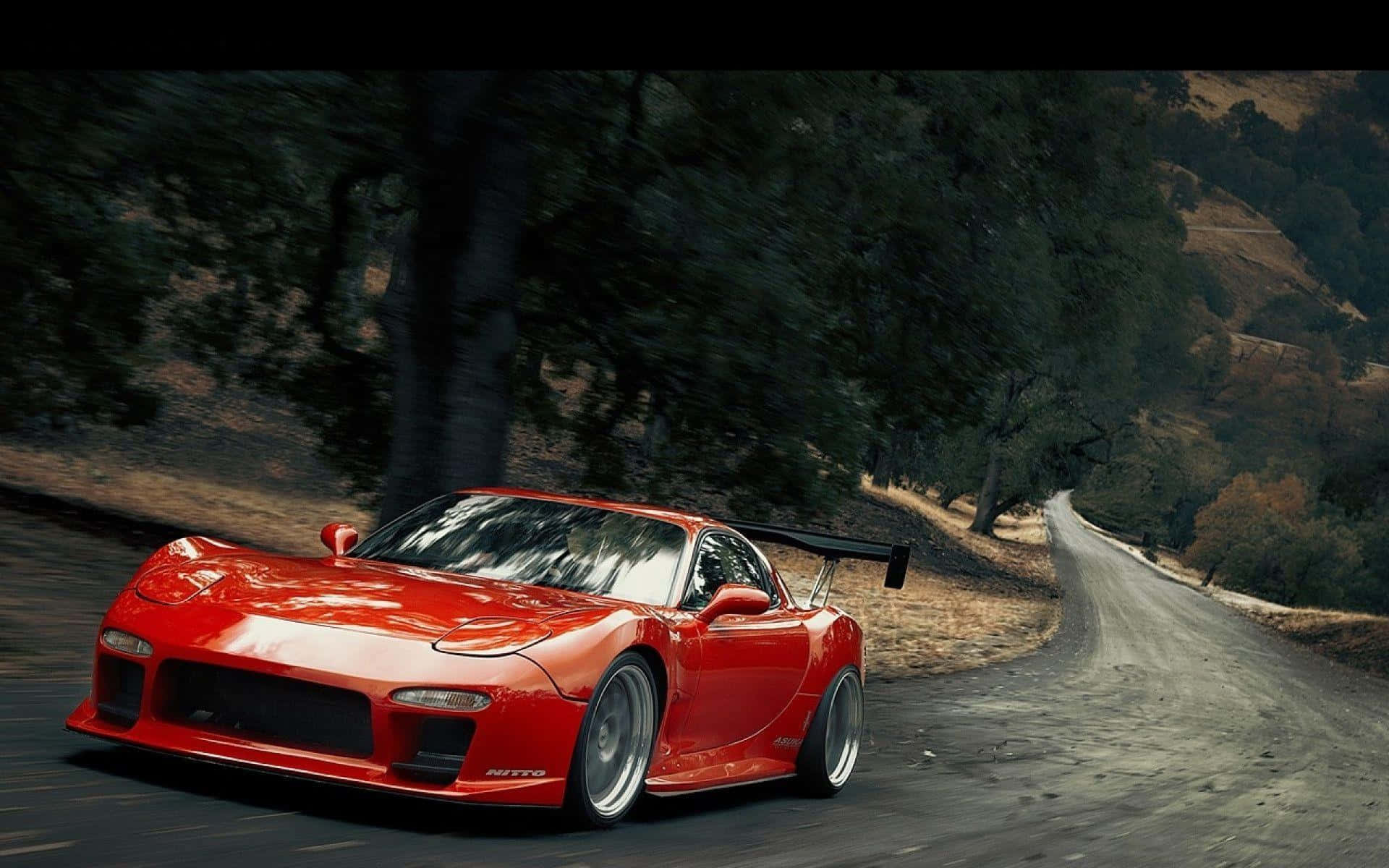 Red Mazda Rx 7 Driving Uphill Wallpaper