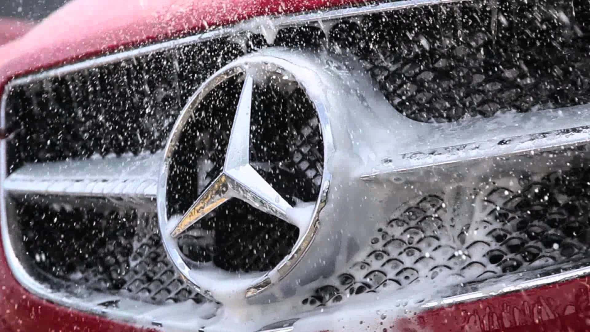 Exceptional Red Mercedes Undergoing Professional Car Detailing Wallpaper