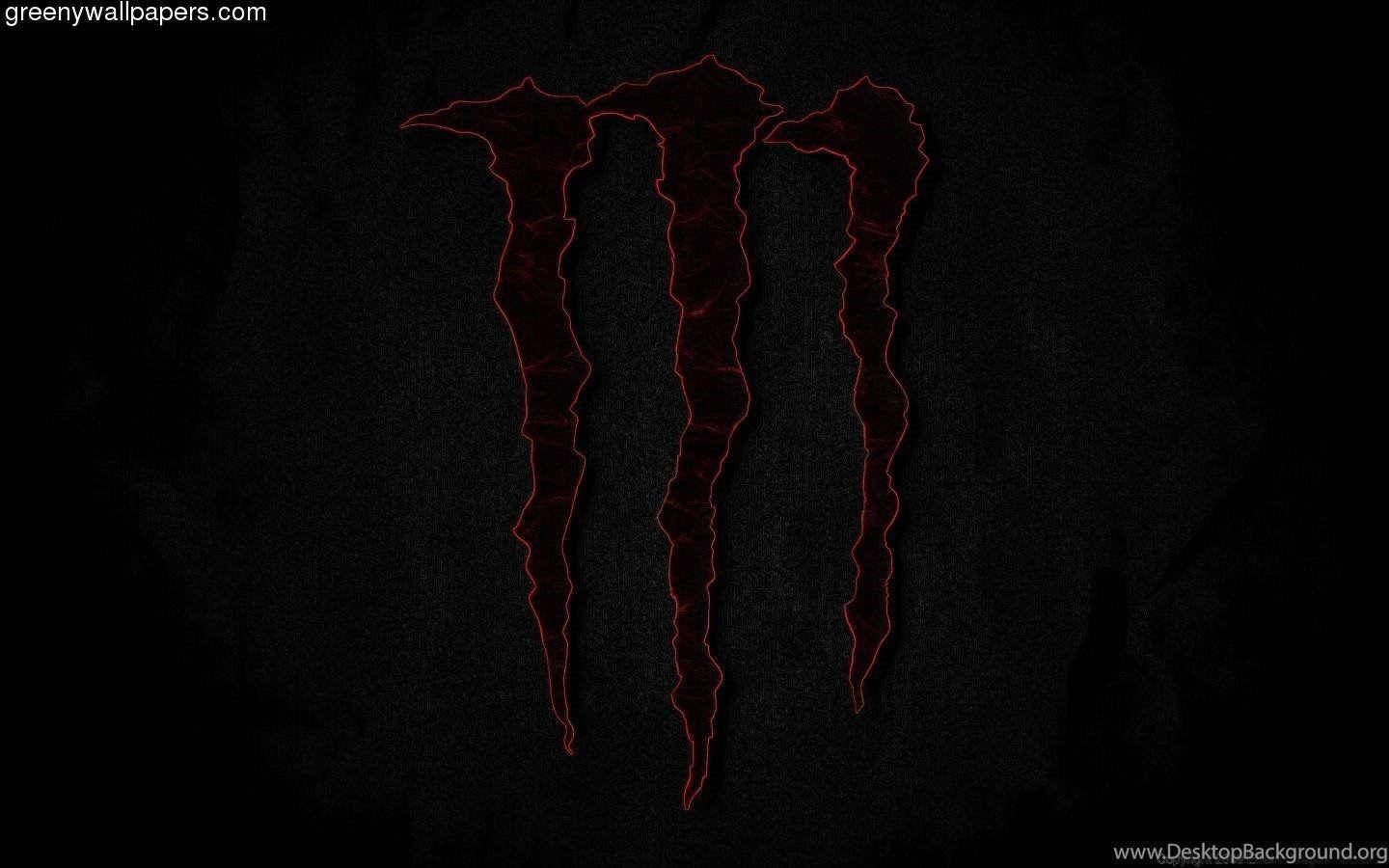Red Monster Logo Over Dark Screen Wallpaper