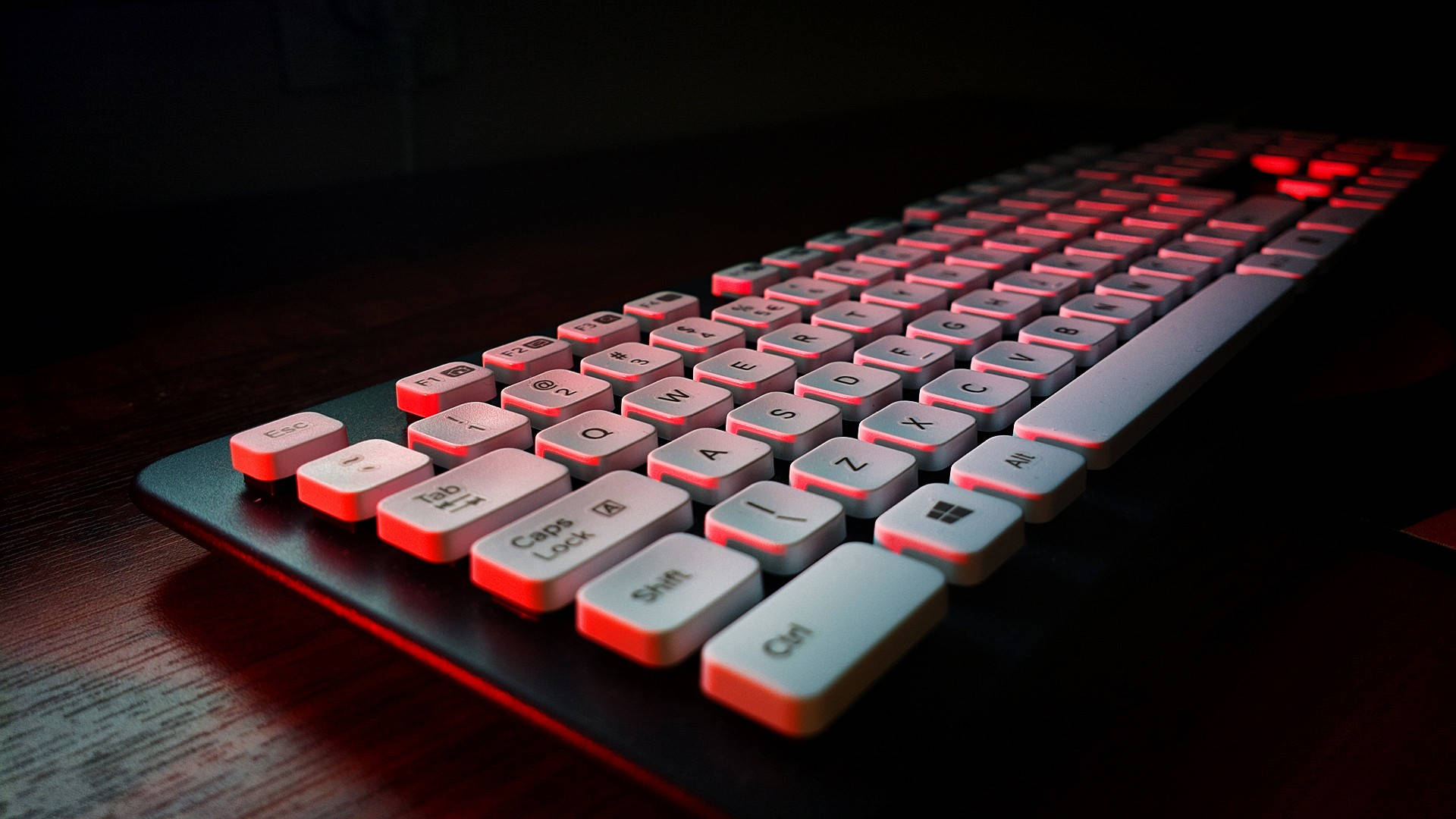 Red Neon Light Computer Keyboard Background