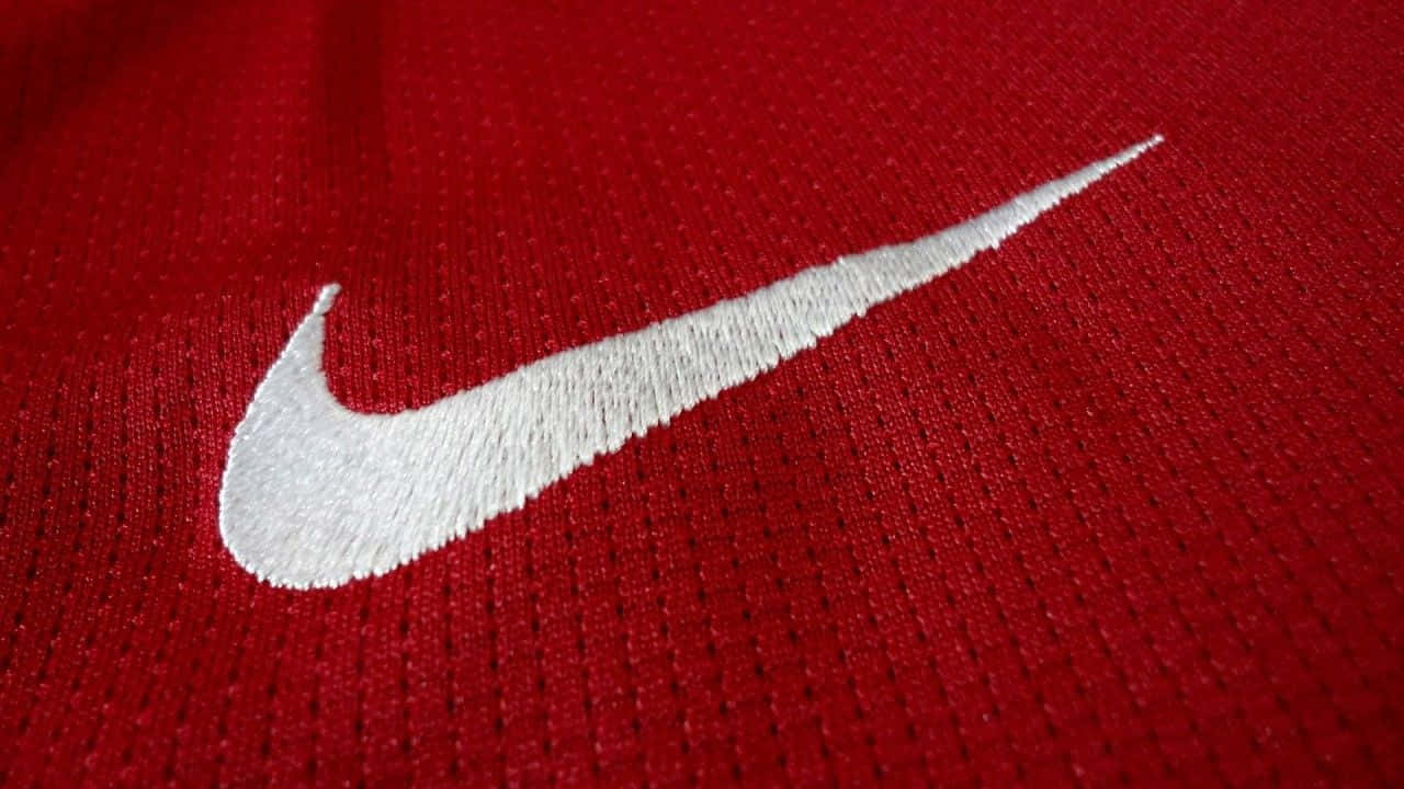 Muestratu Estilo Con El Icónico Nike Rojo Fondo de pantalla