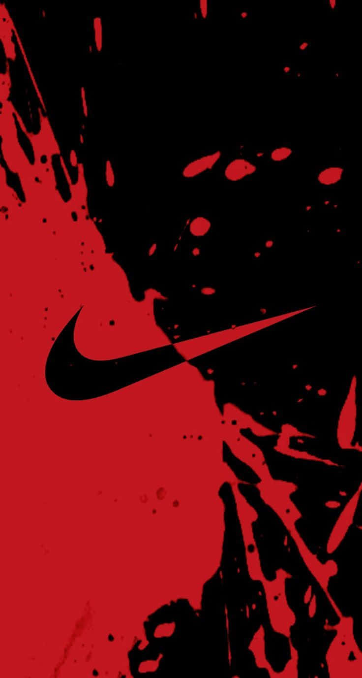 Be bold and fearless in bright Red Nike Sneakers Wallpaper