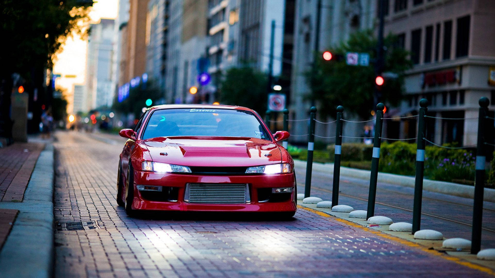 Speed and Style: Red Nissan Silvia S14 Wallpaper