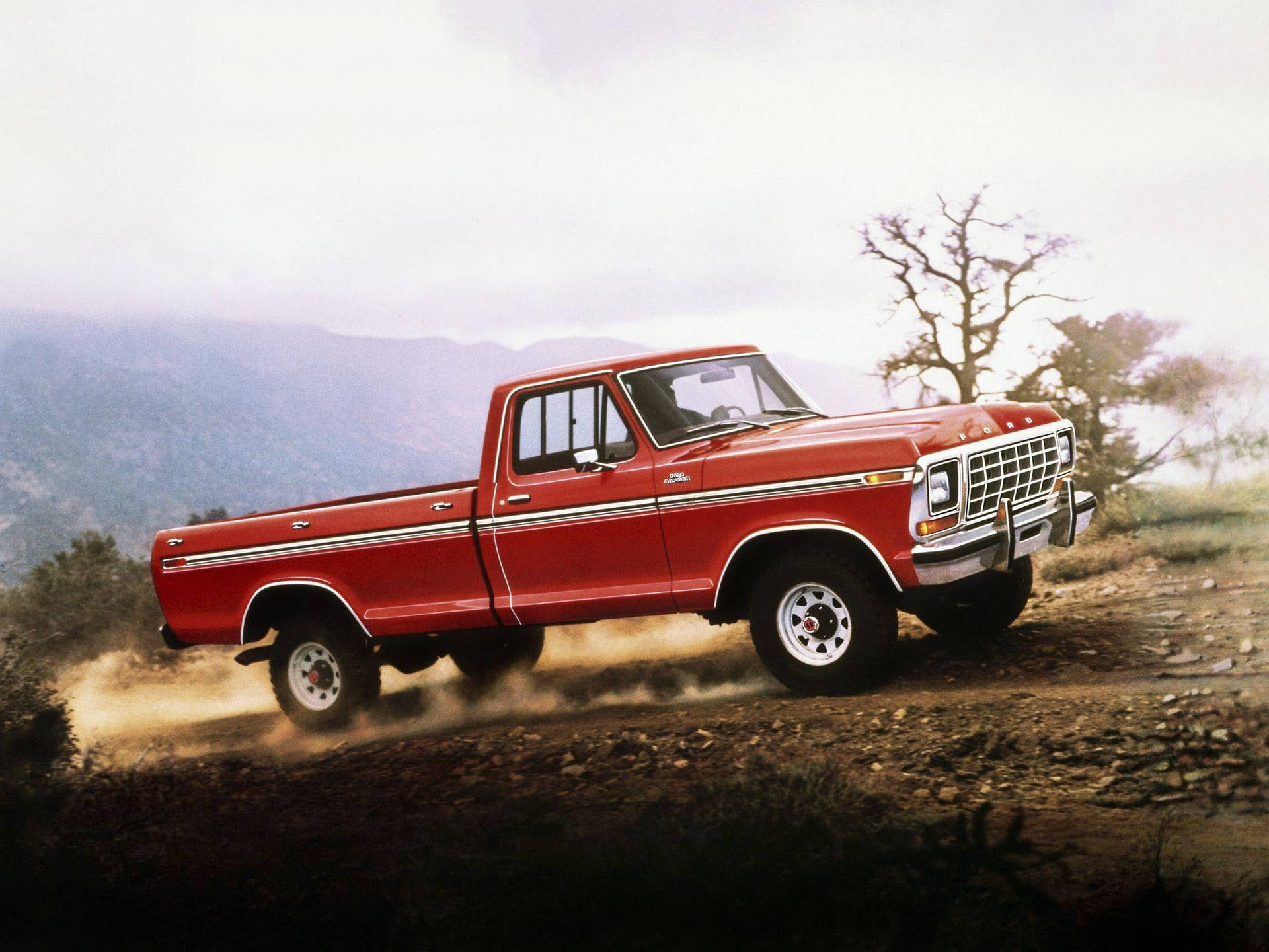 Vintage Charm: Witness the Timeless Beauty of a Red Old Ford Truck Wallpaper