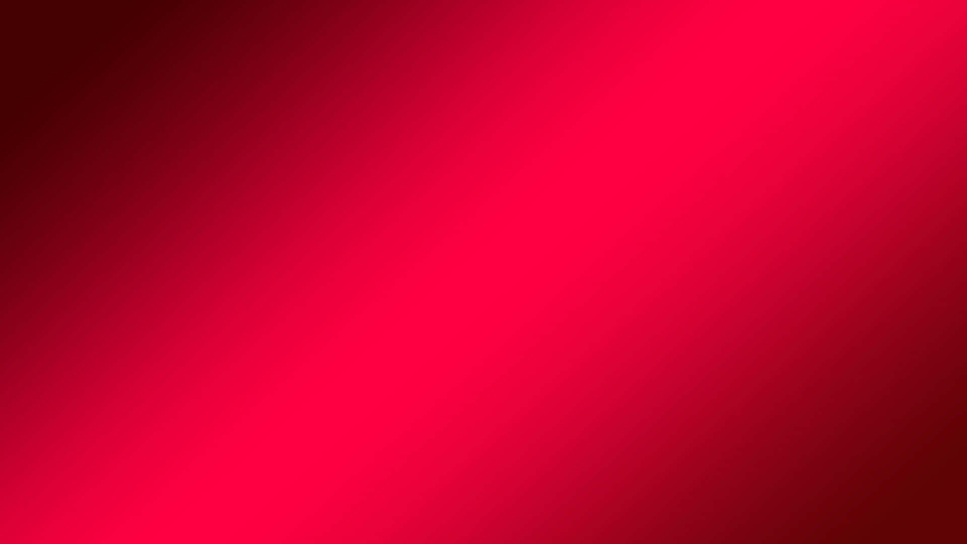 A Red Background With A Light Red Color
